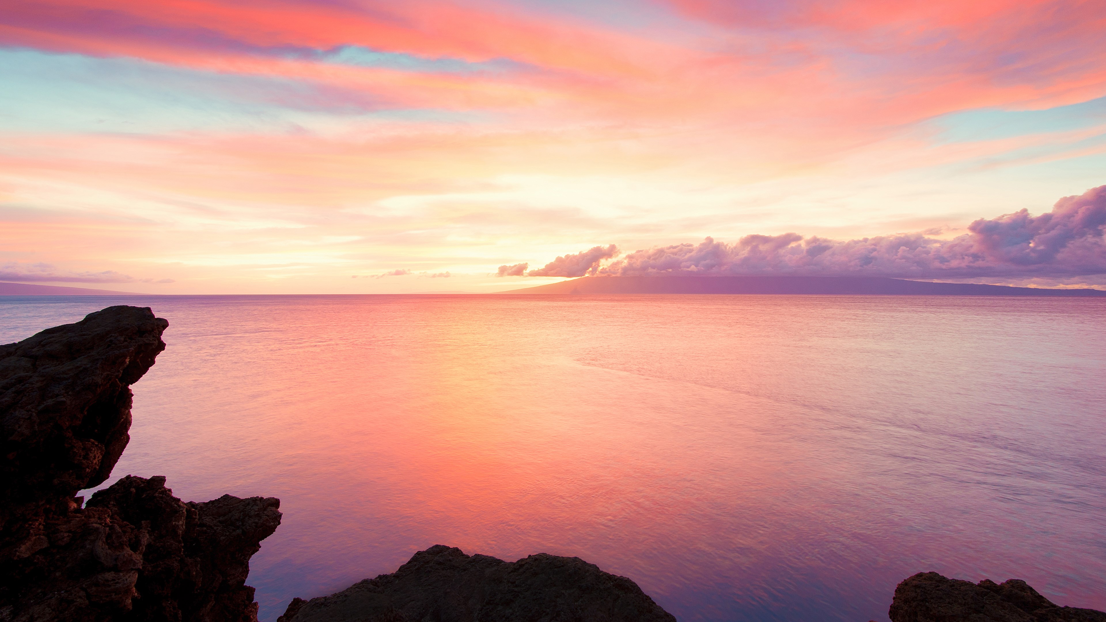 Sunset over the ocean with rocky foreground HD Wallpaper