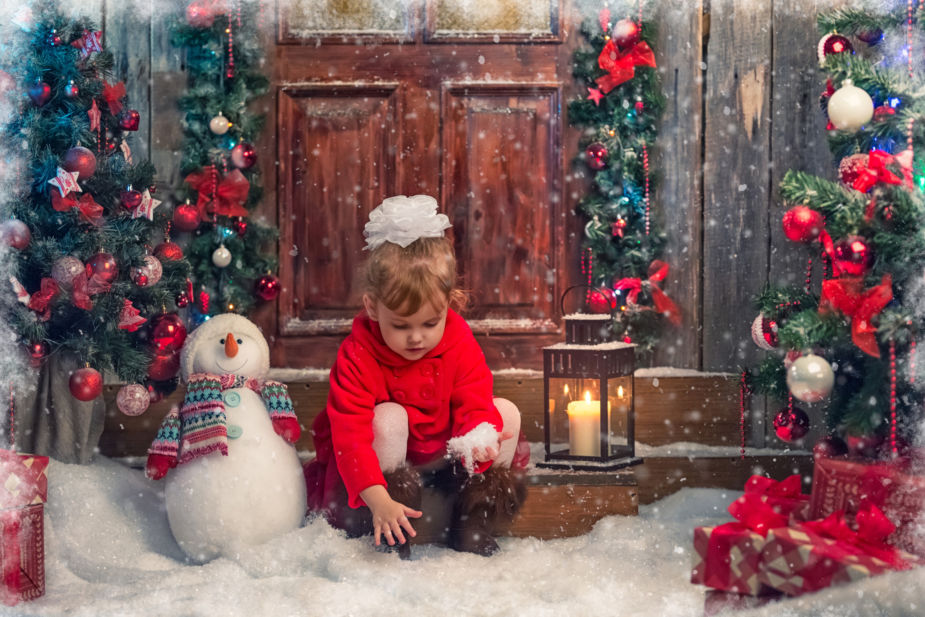 Little girl in red with Christmas decorations and snowman HD Wallpaper