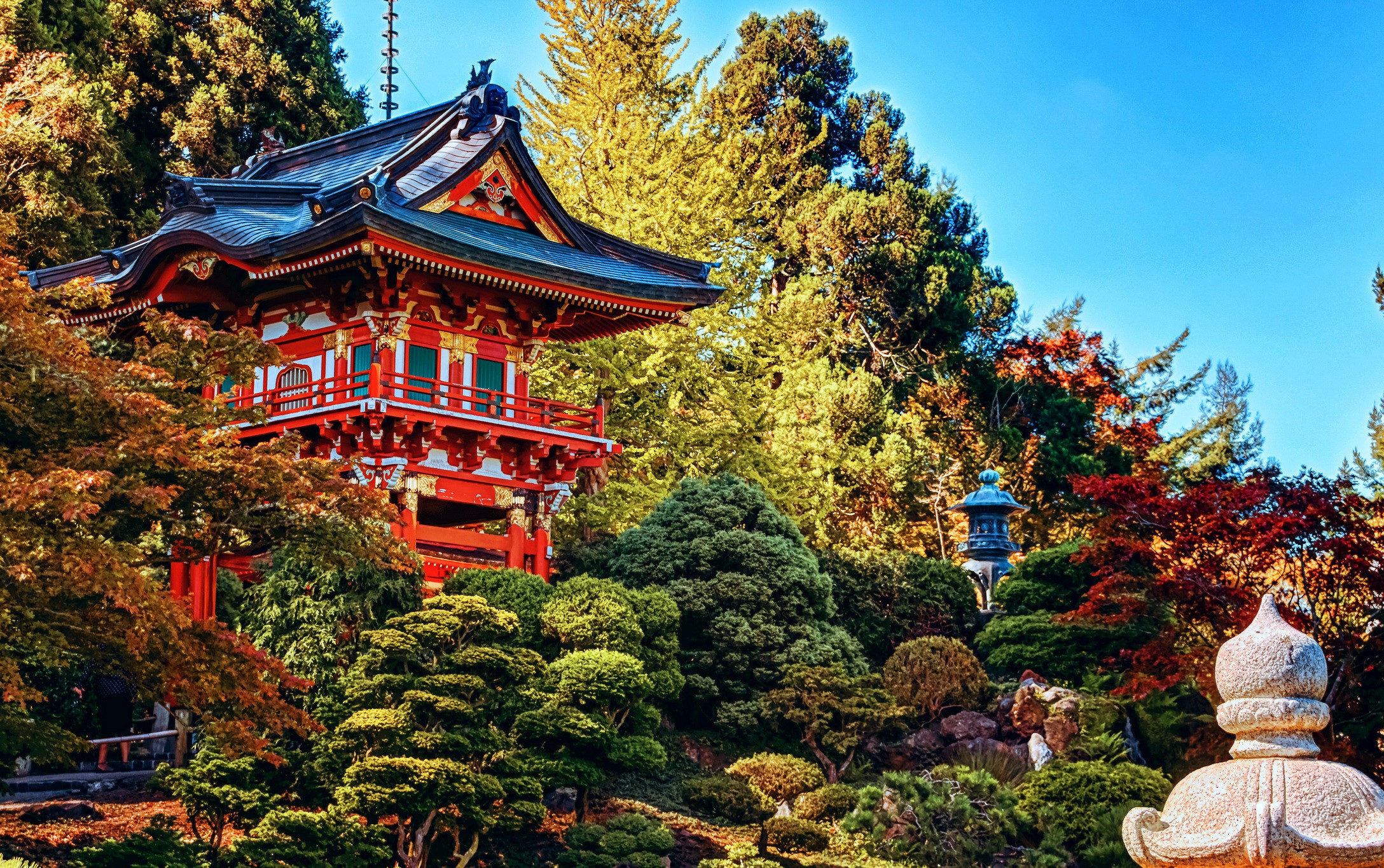 Japanese Pagoda in a Garden with Autumn Foliage HD Wallpaper