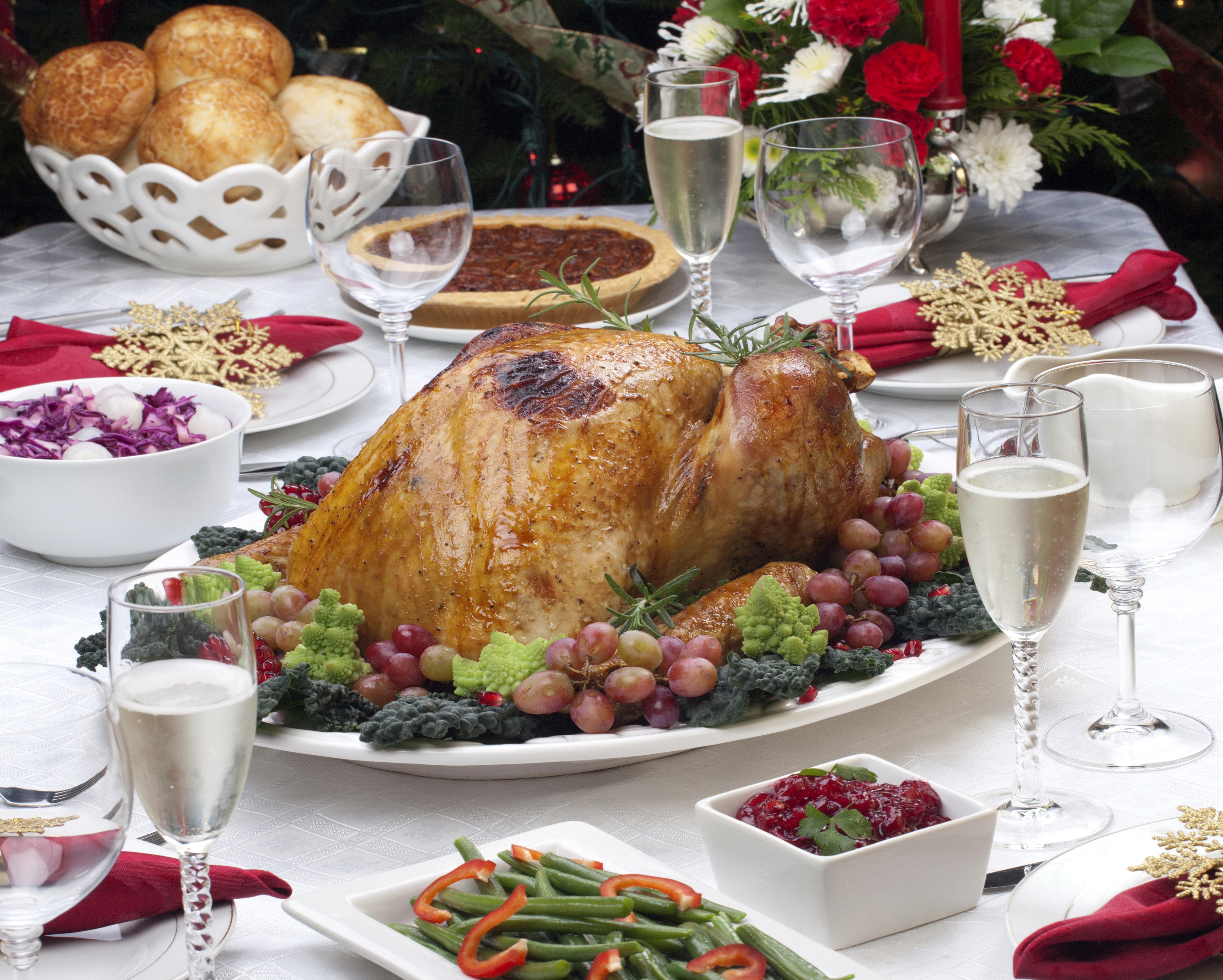 Christmas Dinner Table with Roast Turkey and Sides HD Wallpaper