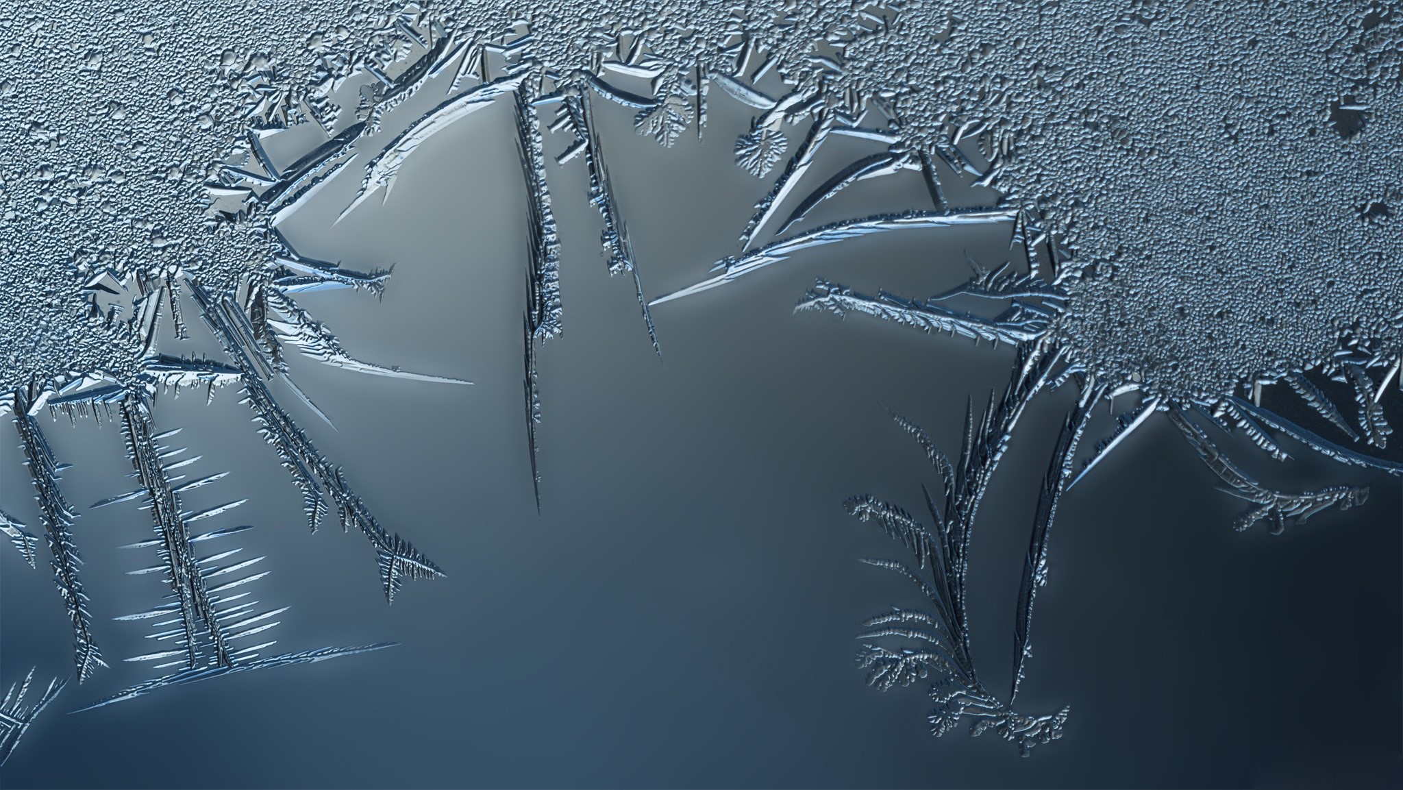 Close-up of frost patterns on glass HD Wallpaper
