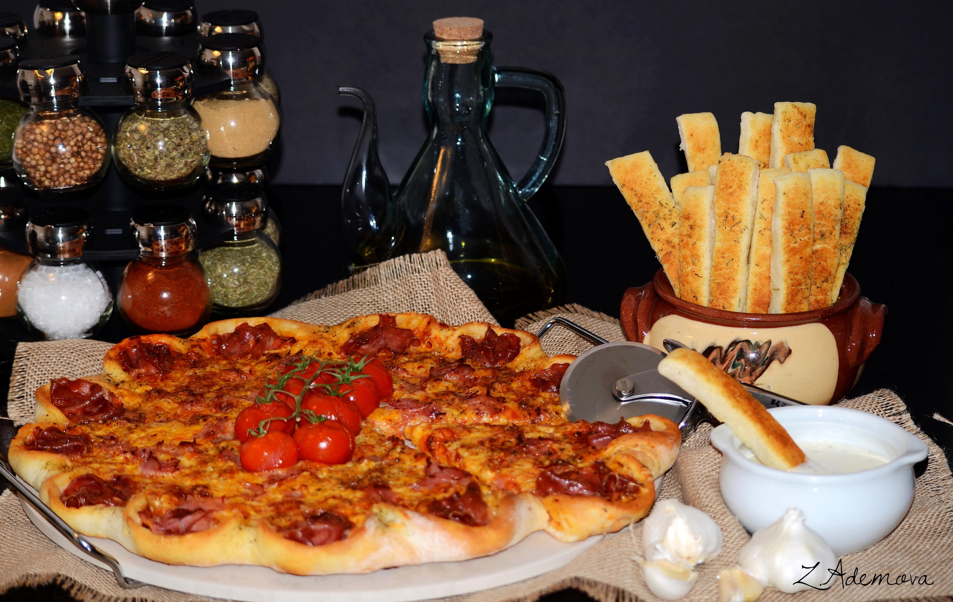 Pizza with breadsticks and spices HD Wallpaper