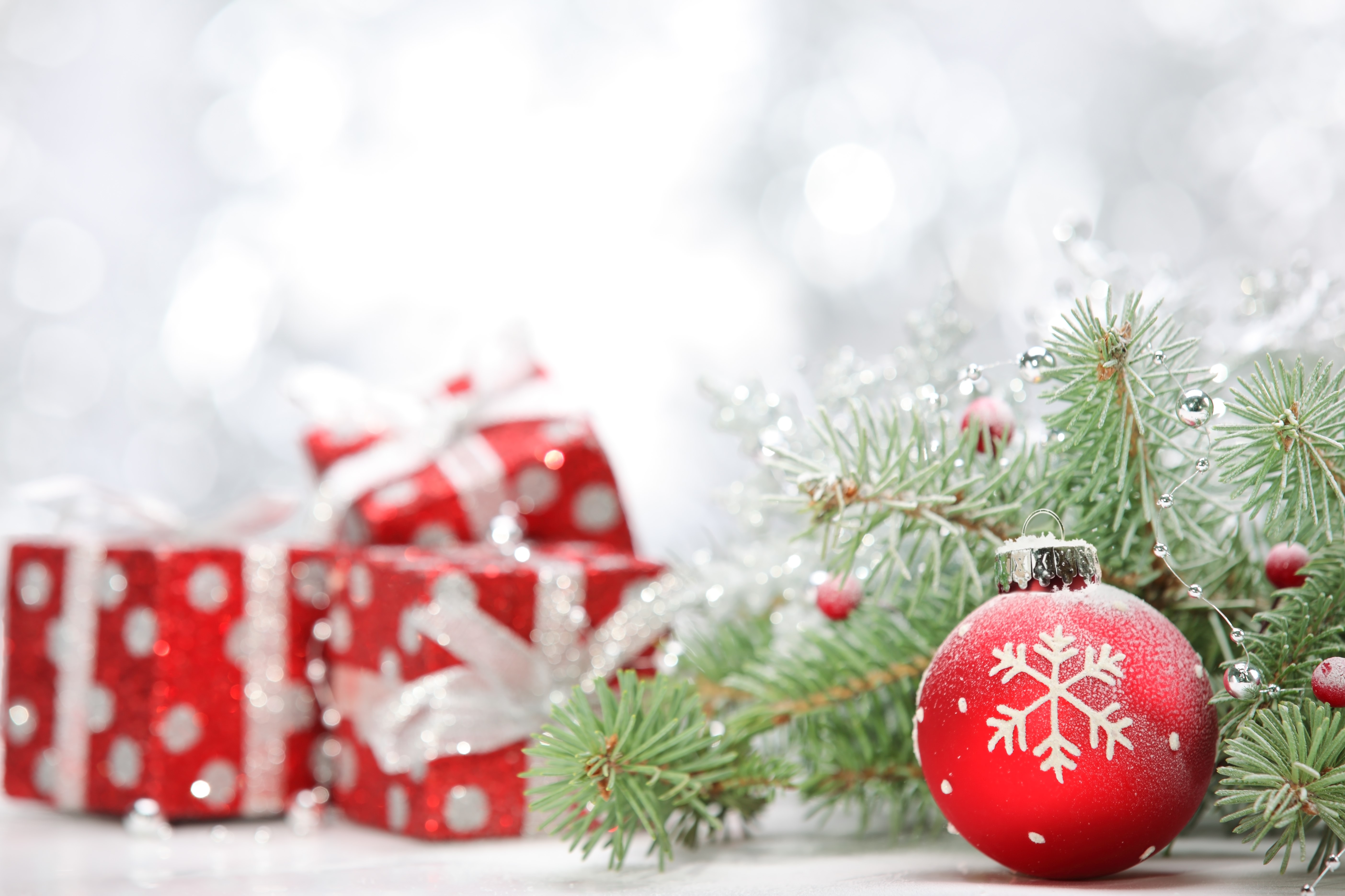 Christmas Gifts and Ornaments on Pine Branches HD Wallpaper