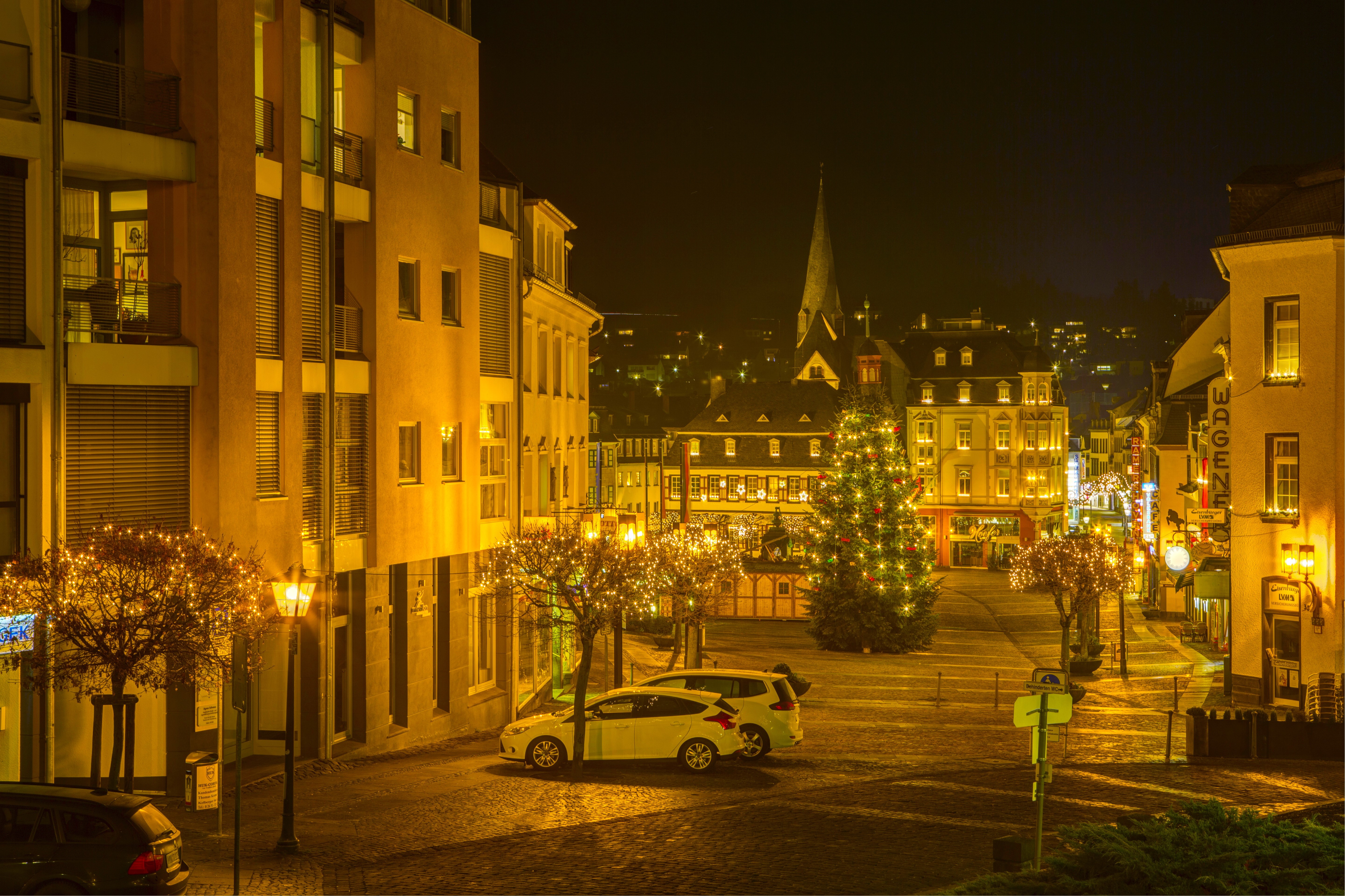 Night view of Mayen, Germany with Christmas tree and lights HD Wallpaper
