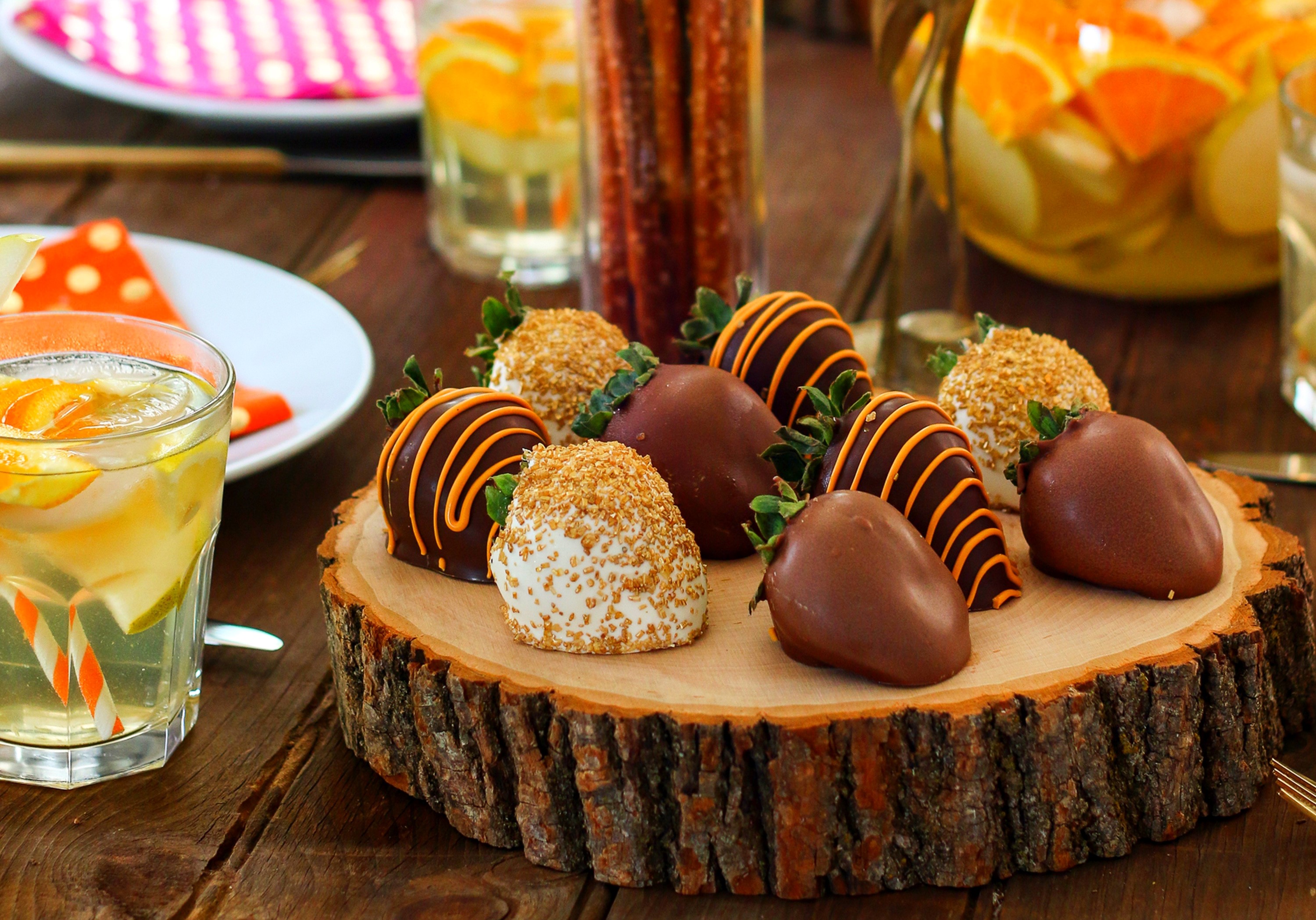 Chocolate covered strawberries on a wooden board HD Wallpaper
