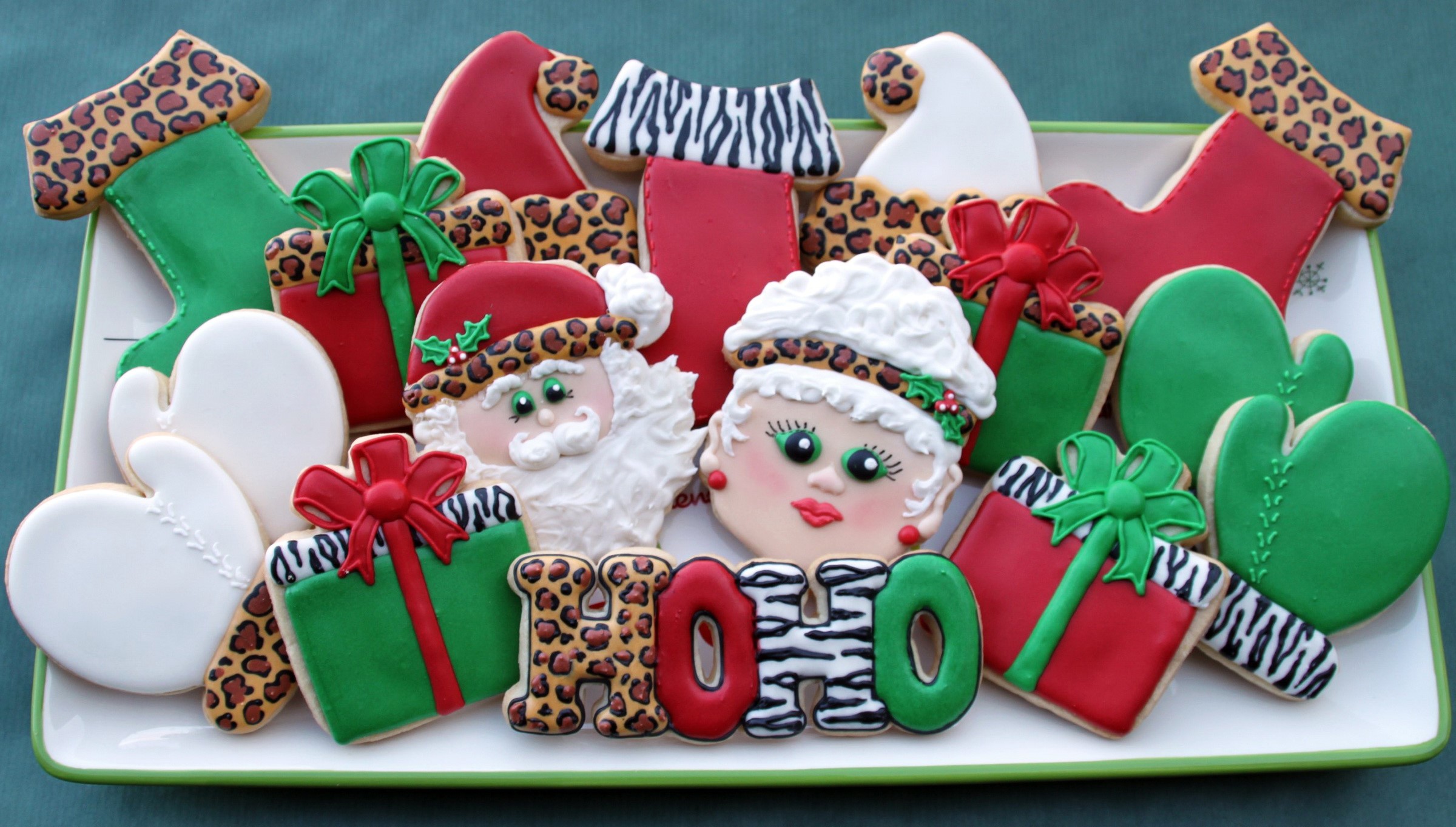 Christmas Cookies with Santa, Mrs. Claus, and Presents HD Wallpaper