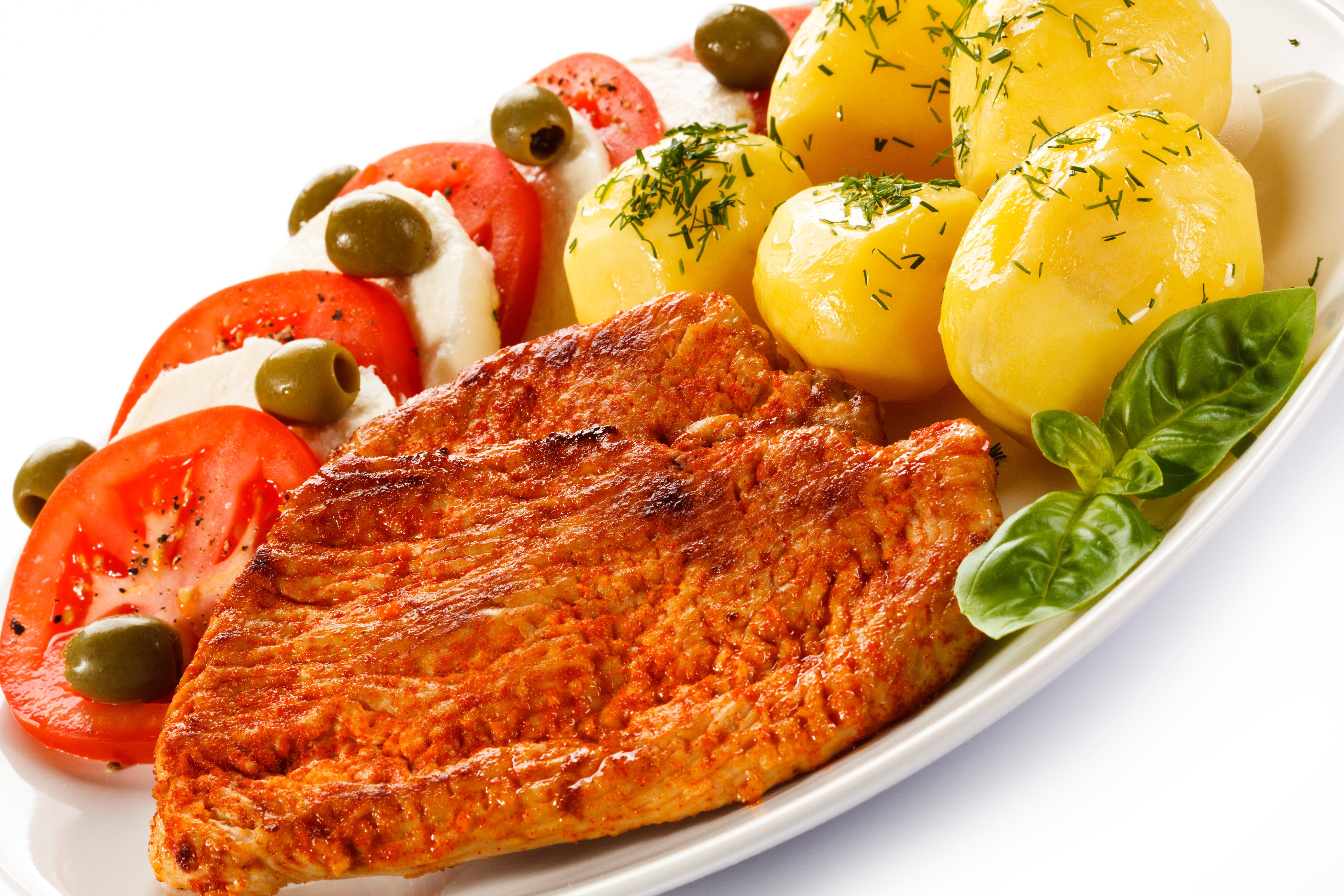 Meat with potatoes, tomatoes, and olives HD Wallpaper