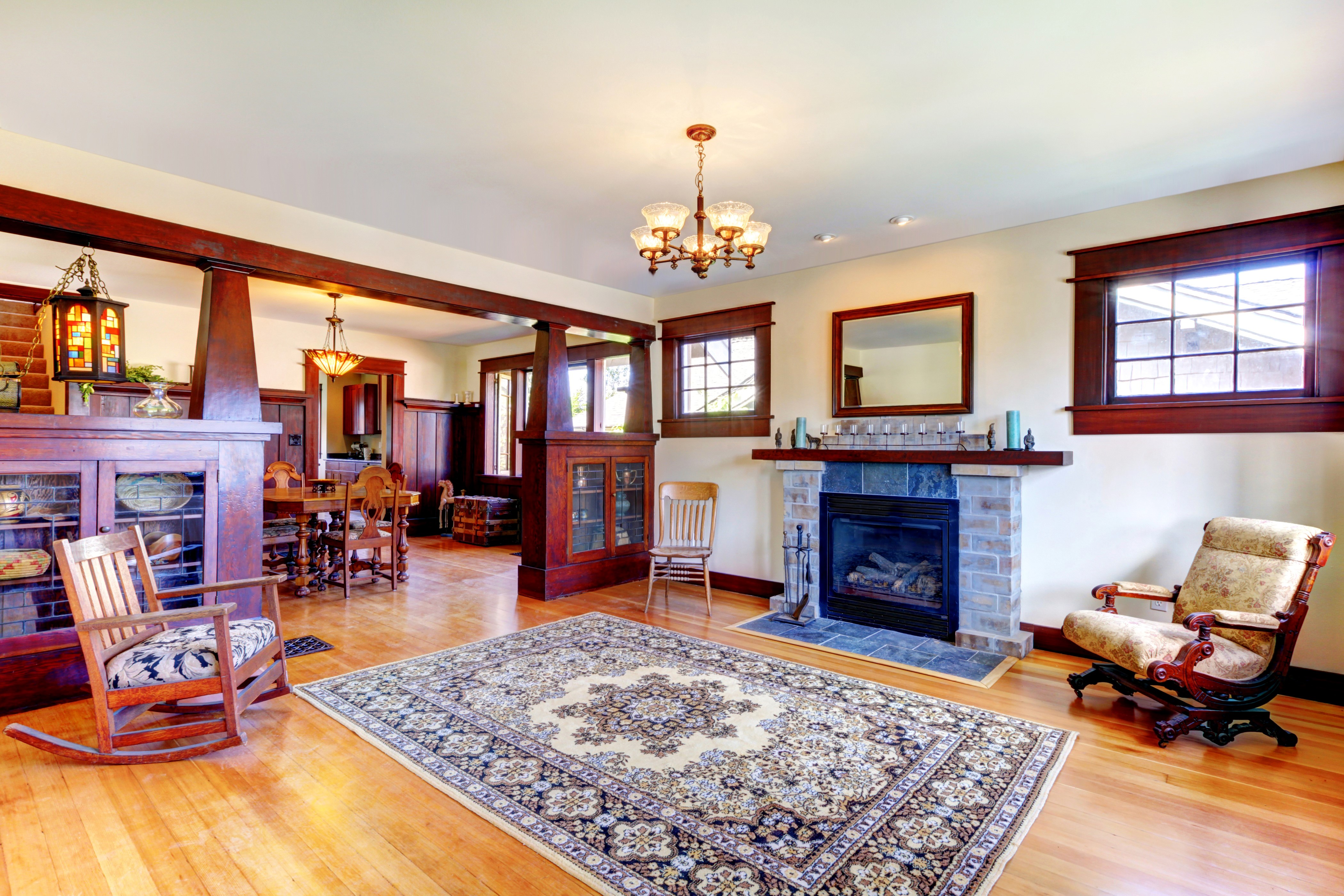 Living room with fireplace and armchair HD Wallpaper
