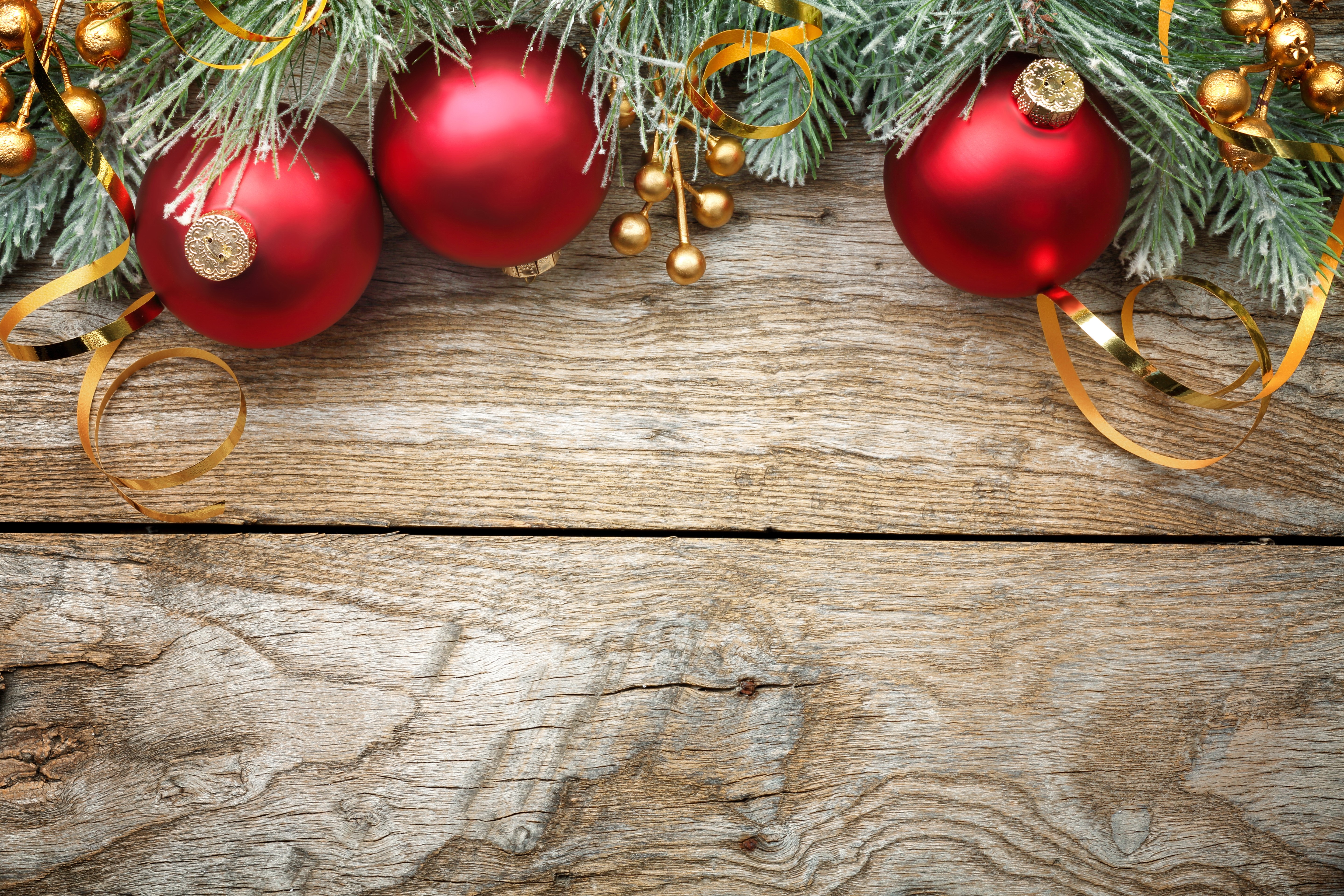 Christmas ornaments and branches on wooden background HD Wallpaper