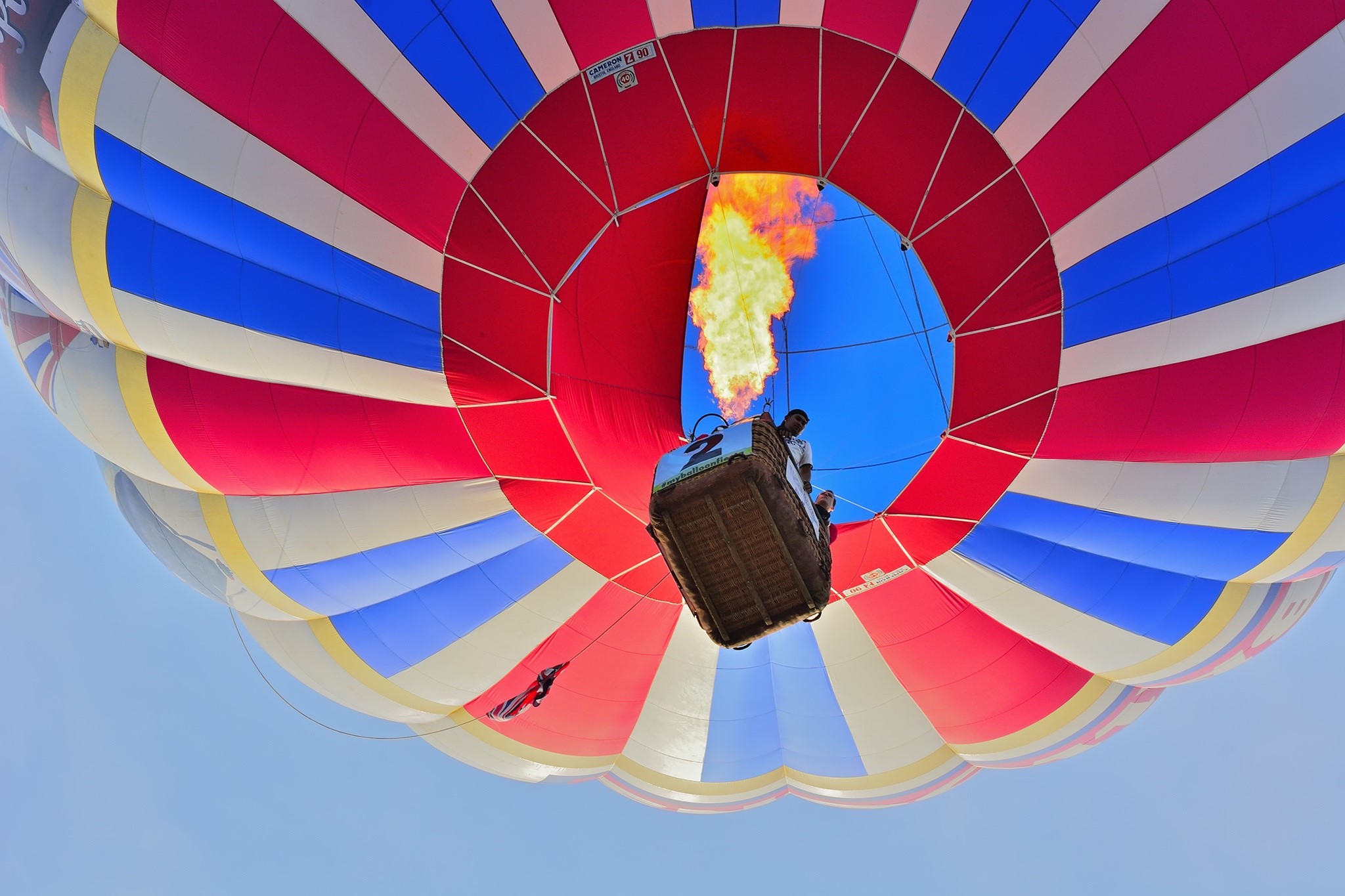 Hot air balloon with flame and basket HD Wallpaper