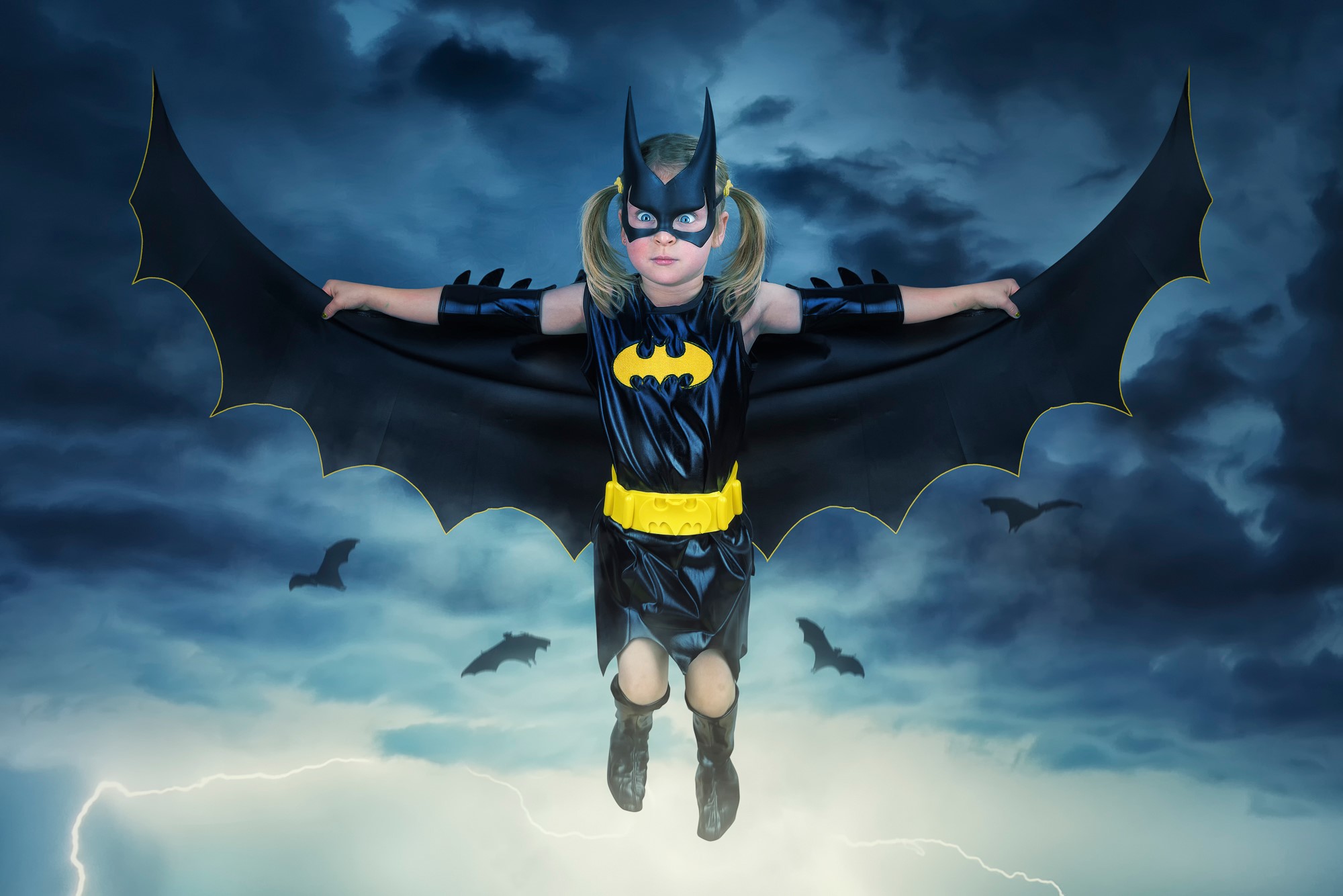 Girl in Bat Costume Flying with Bats and Lightning HD Wallpaper