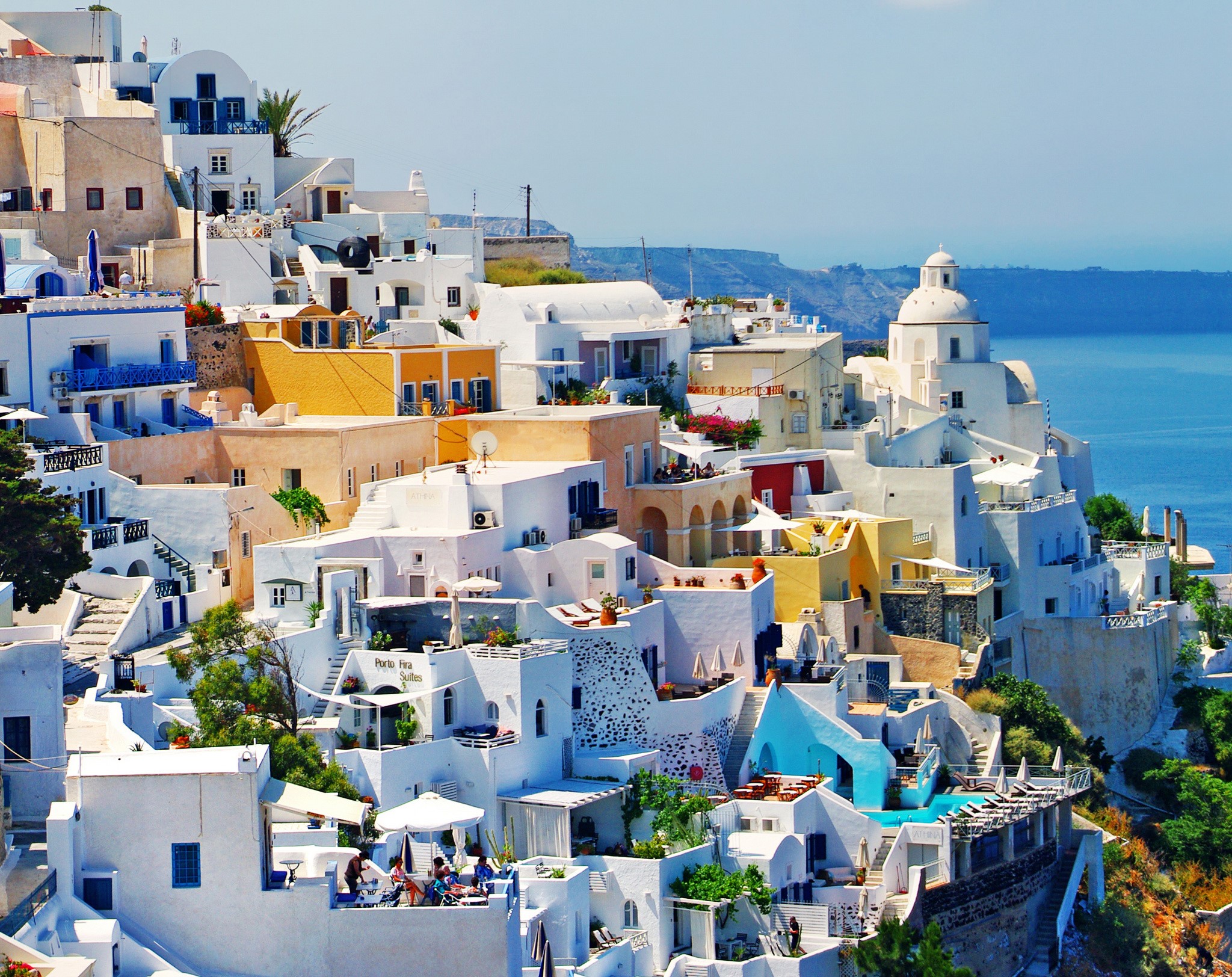 White houses on a hillside in Santorini, Greece HD Wallpaper