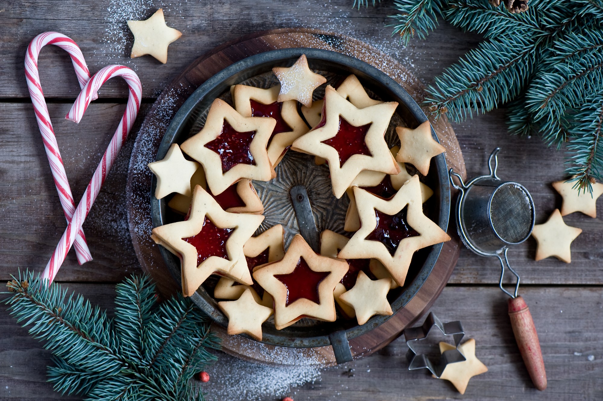 Christmas star cookies with jam and candy canes HD Wallpaper