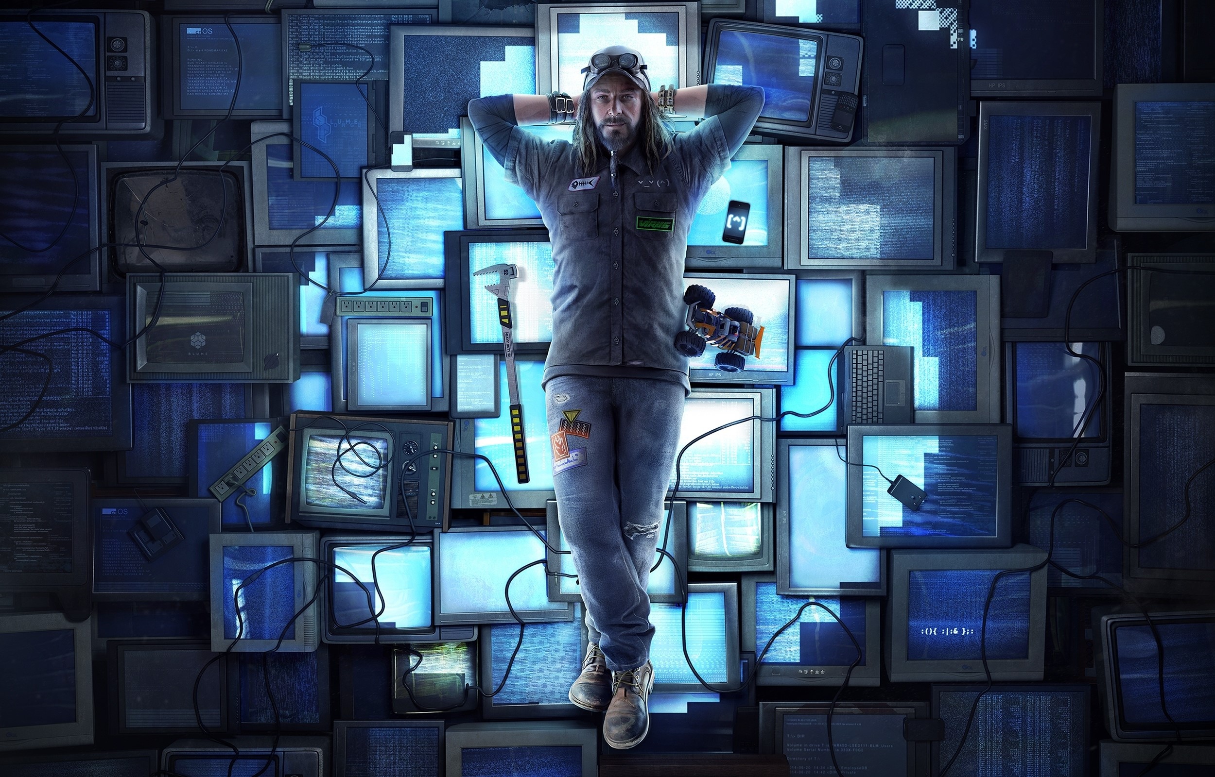 Man in baseball cap with tools in front of monitors HD Wallpaper
