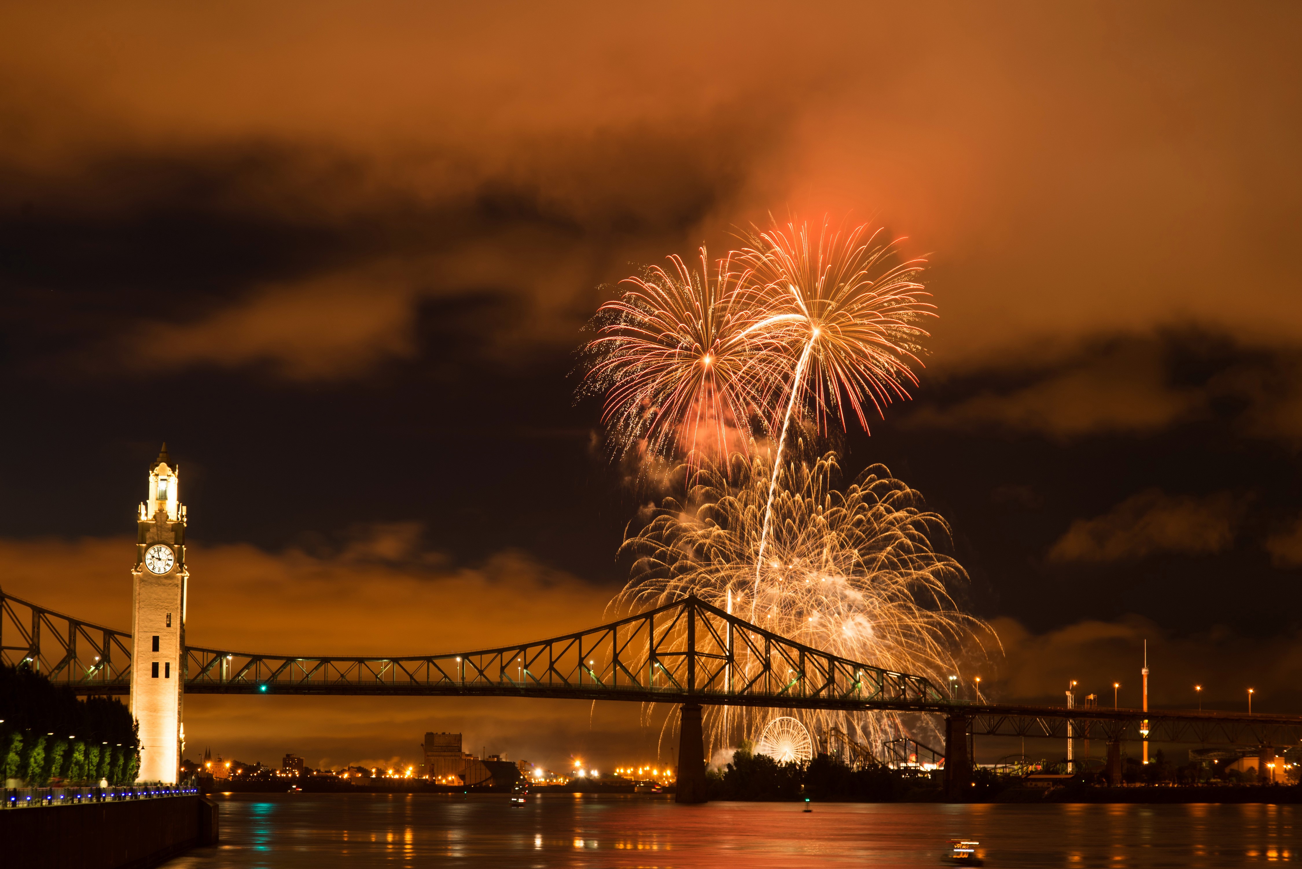 Fireworks over Montreal Bridge at Night HD Wallpaper