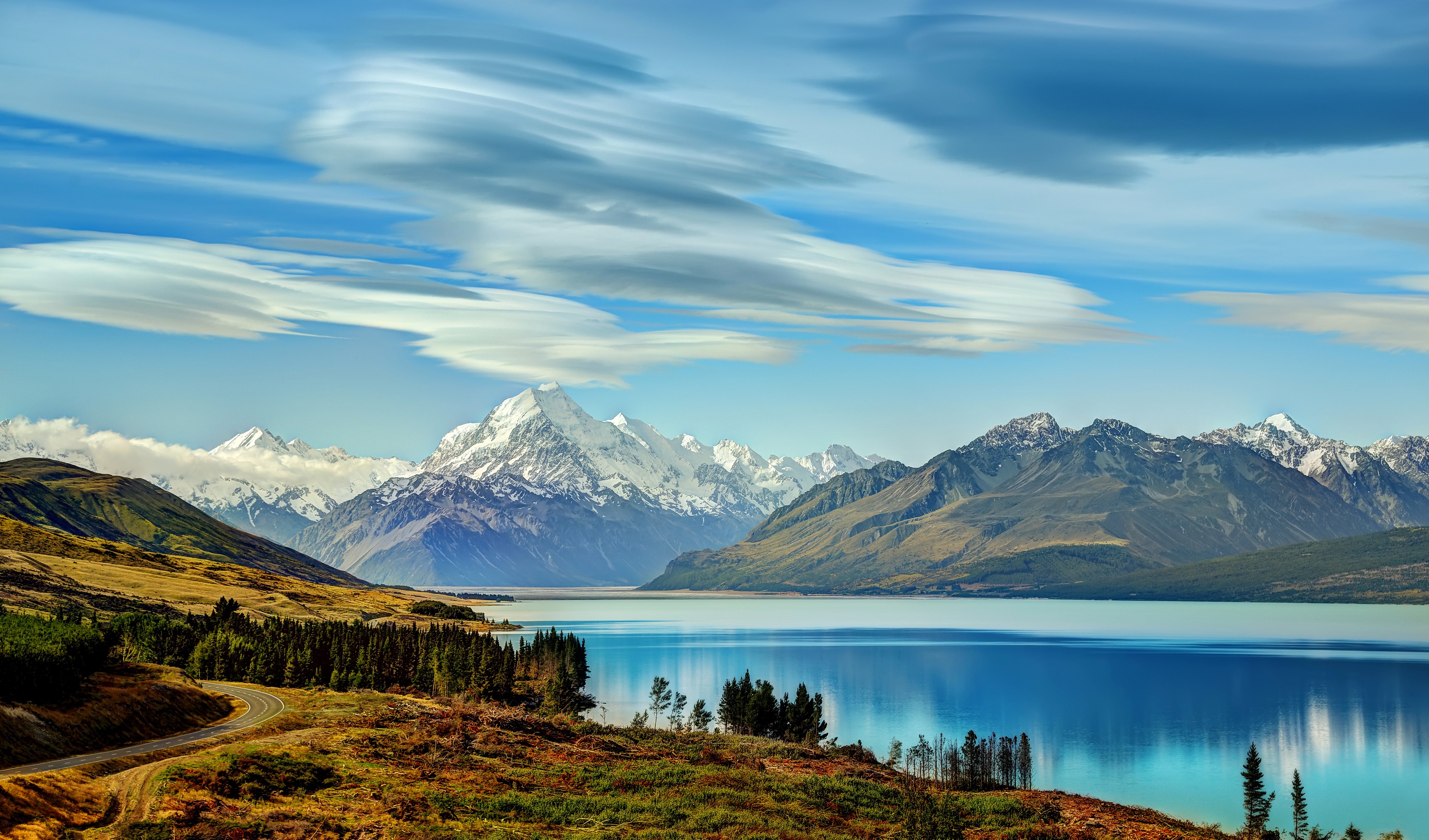 Lake Pukaki with Snow-Capped Mountains in New Zealand HD Wallpaper