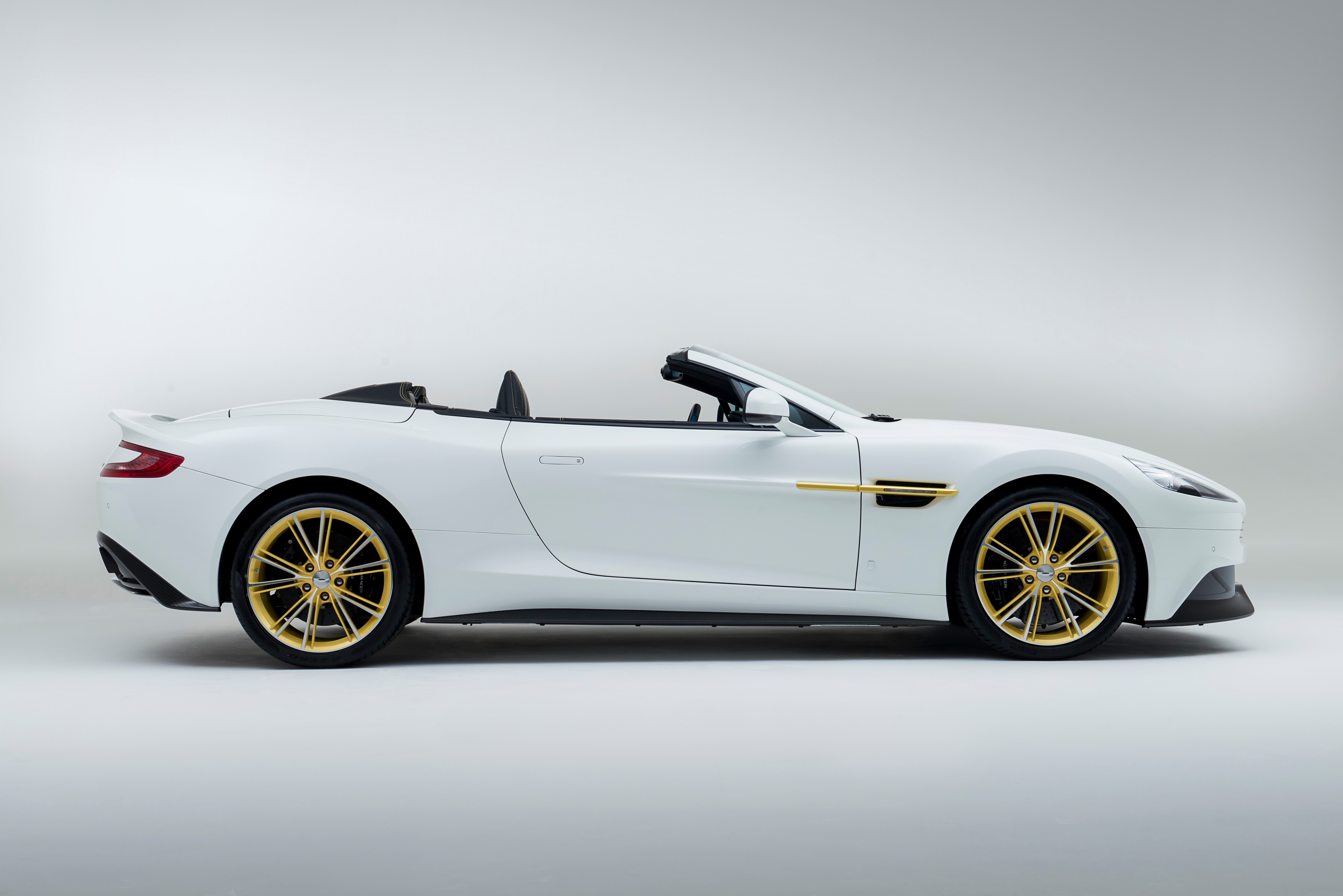 White Aston Martin Vanquish Cabriolet with Gold Wheels HD Wallpaper