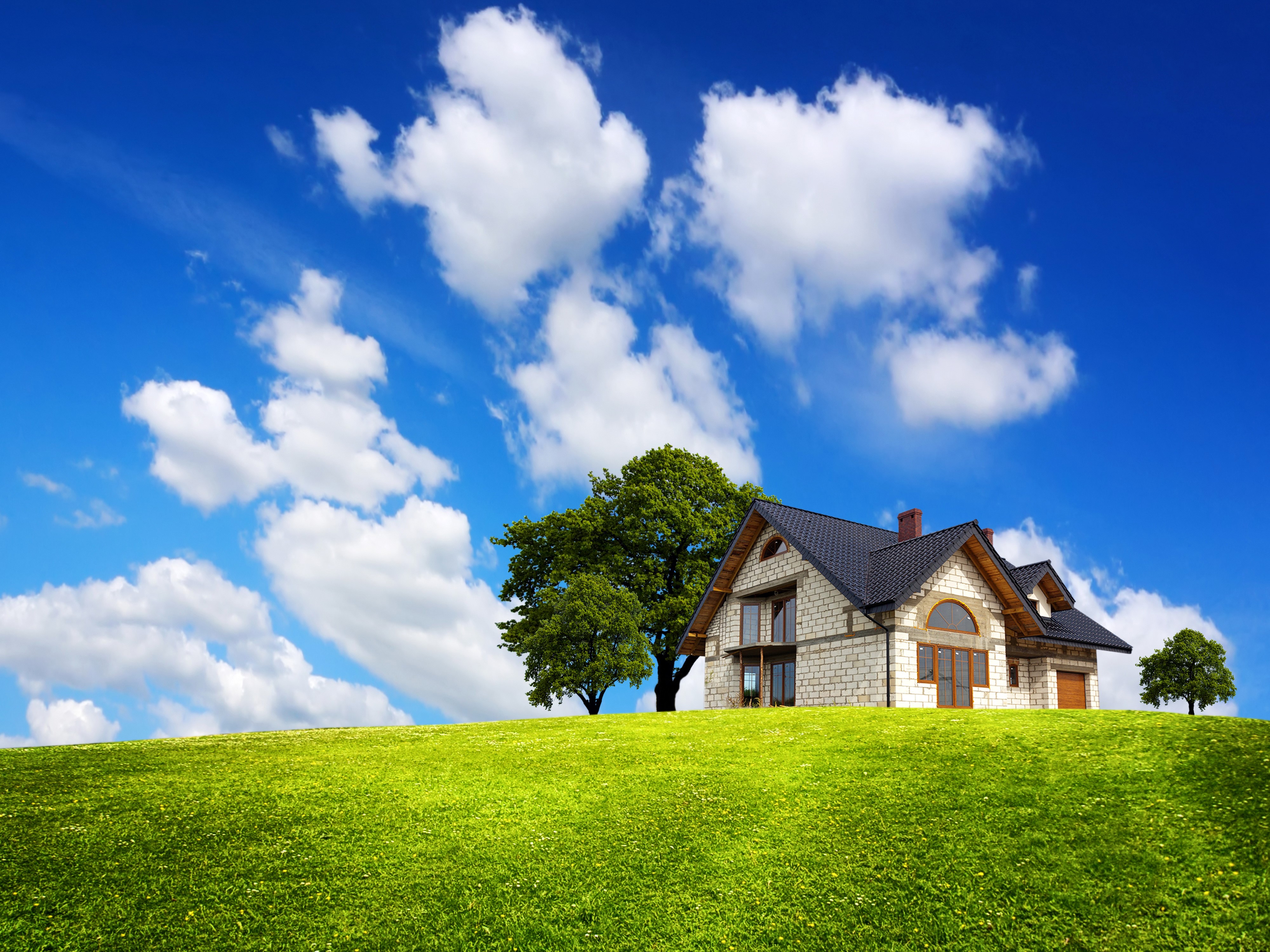 House on a grassy hill under a cloudy sky HD Wallpaper
