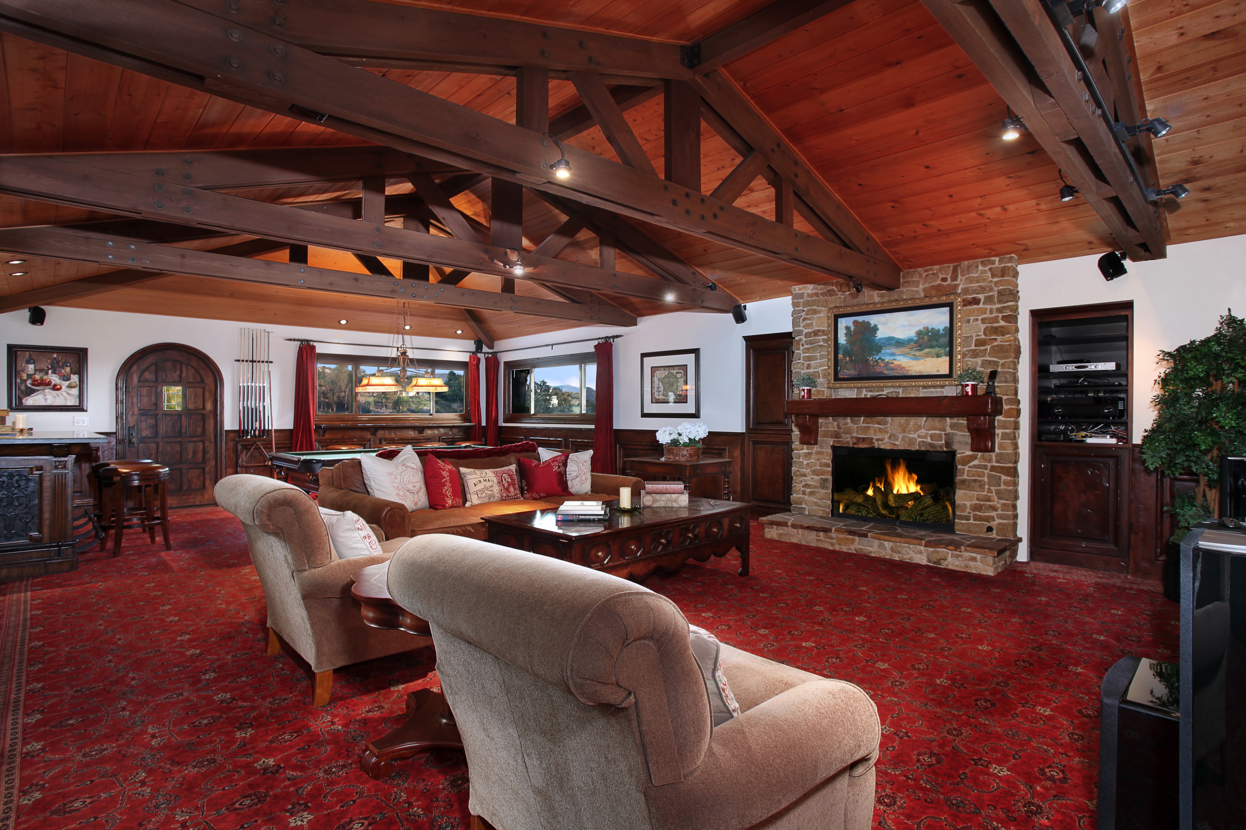 Living room with fireplace and pool table HD Wallpaper