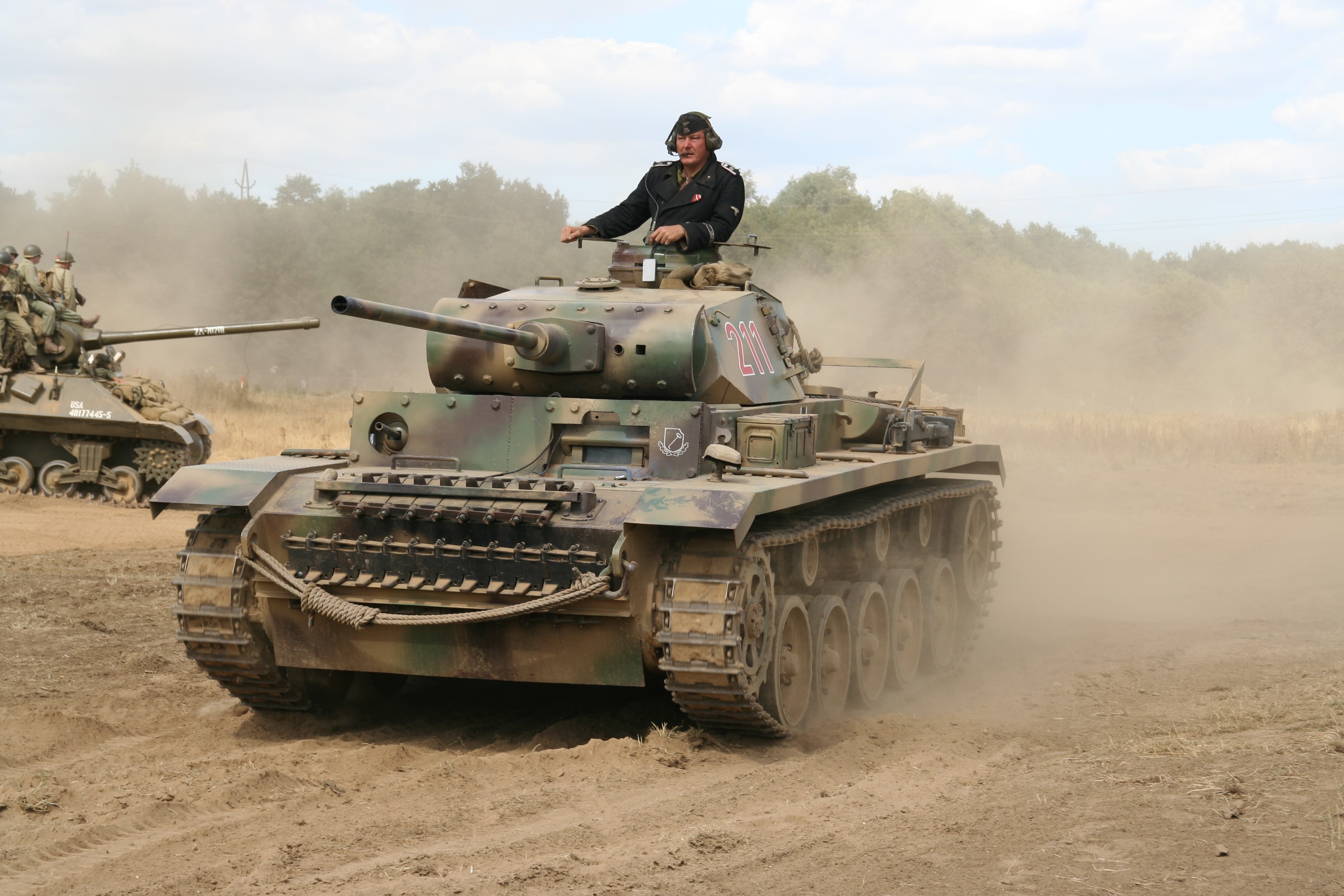 German PzKpfW III tank with crew in action HD Wallpaper