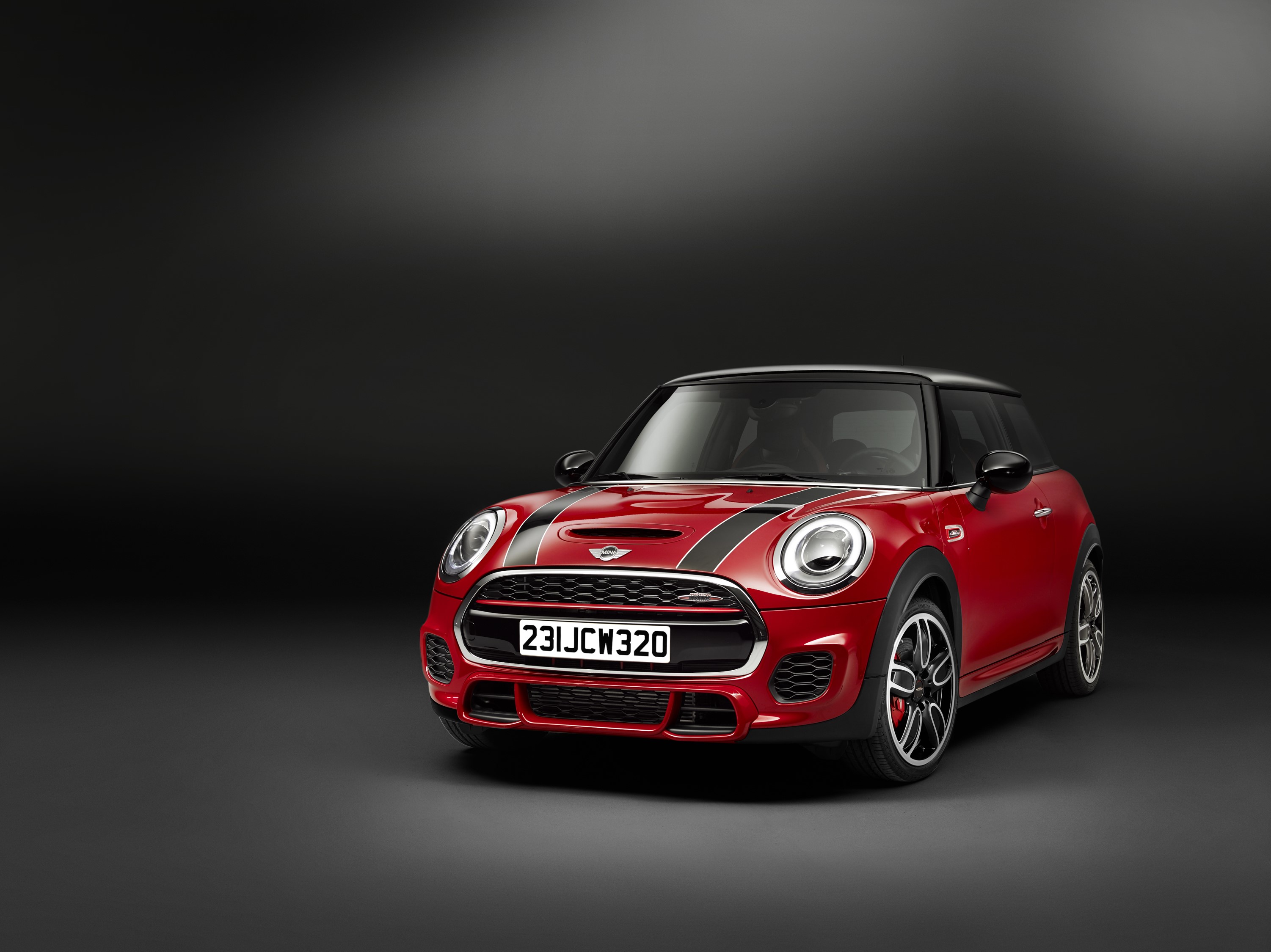 Red Mini John Cooper Works with racing stripes HD Wallpaper