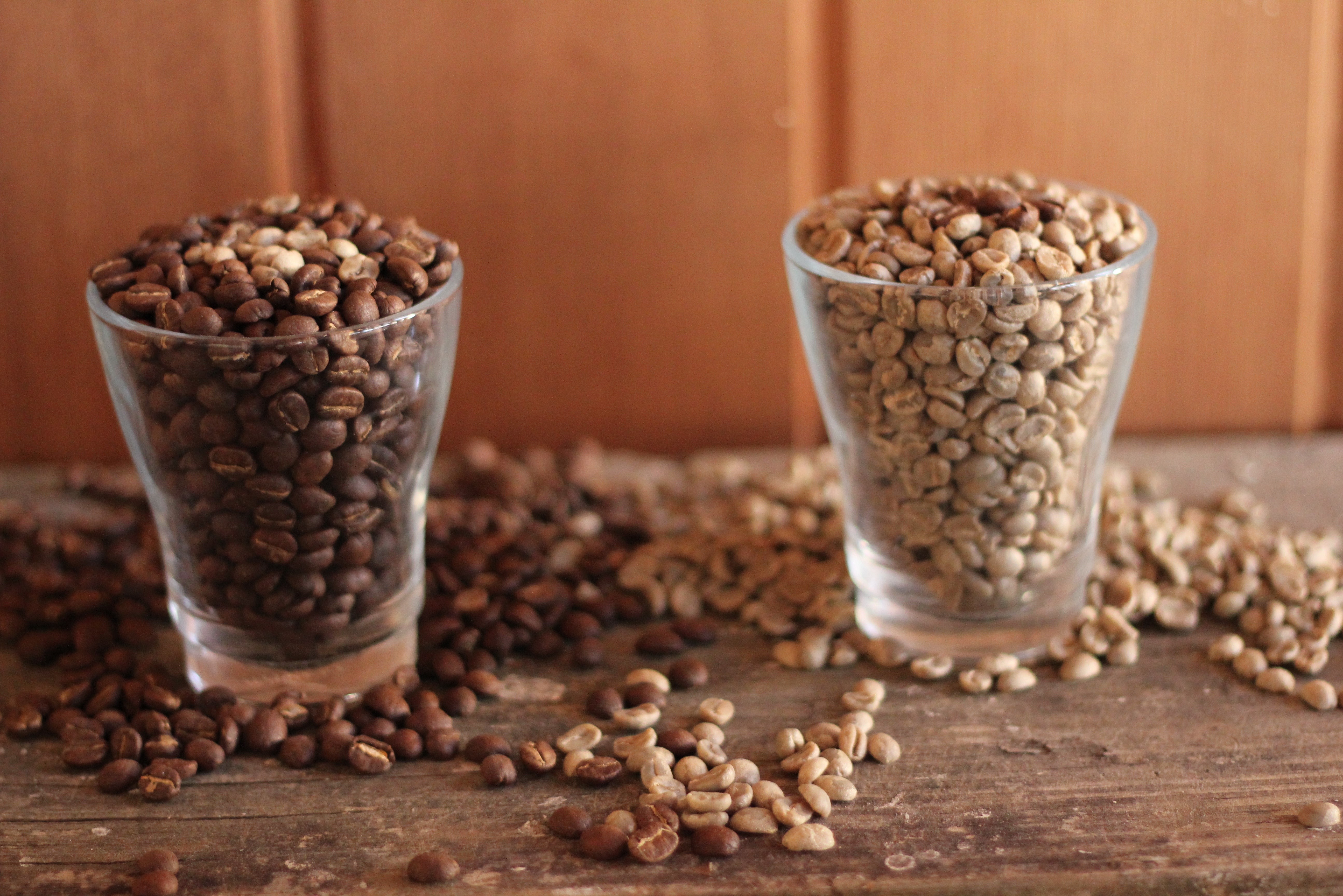 Roasted and Unroasted Coffee Beans in Glasses HD Wallpaper