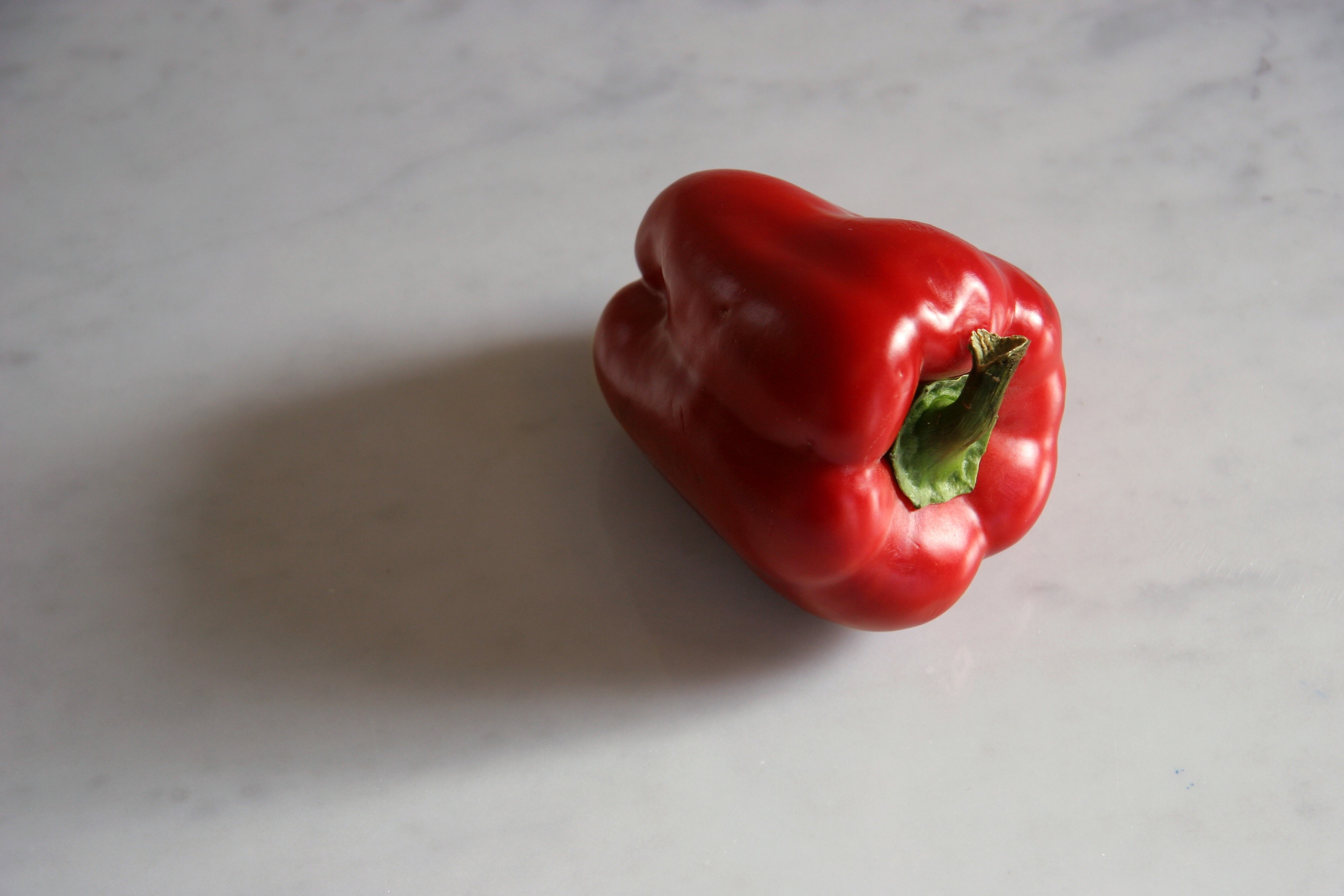 Red Bell Pepper on Marble Surface HD Wallpaper
