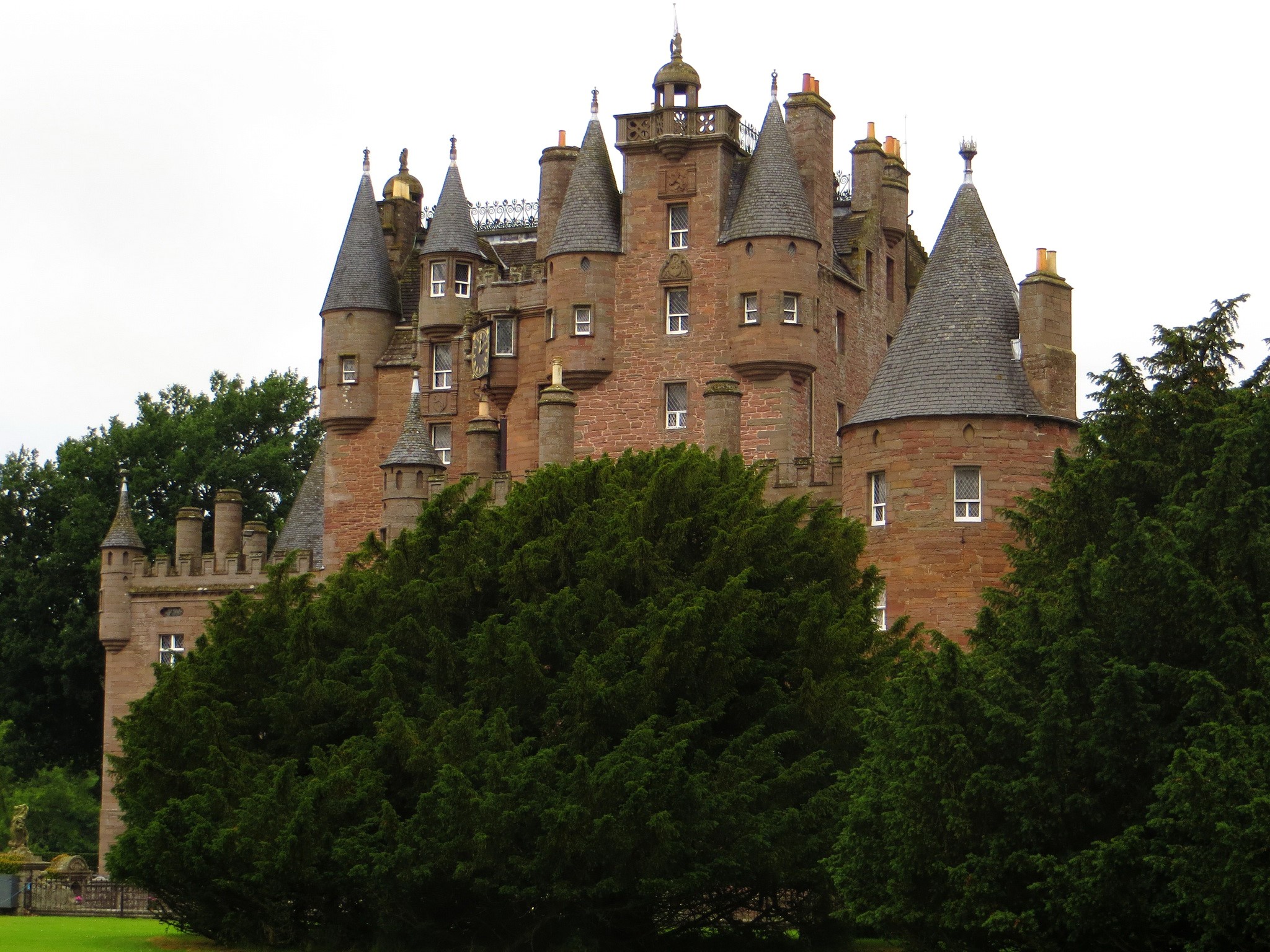 Glamis Castle, Scotland, with trees HD Wallpaper