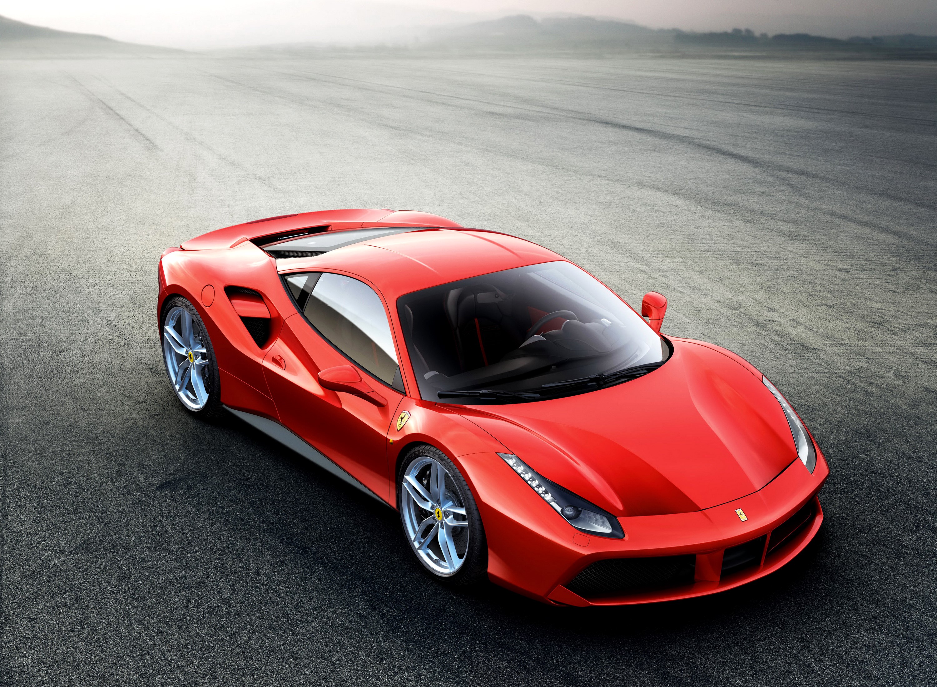 Red Ferrari 488 GTB on a Racetrack HD Wallpaper