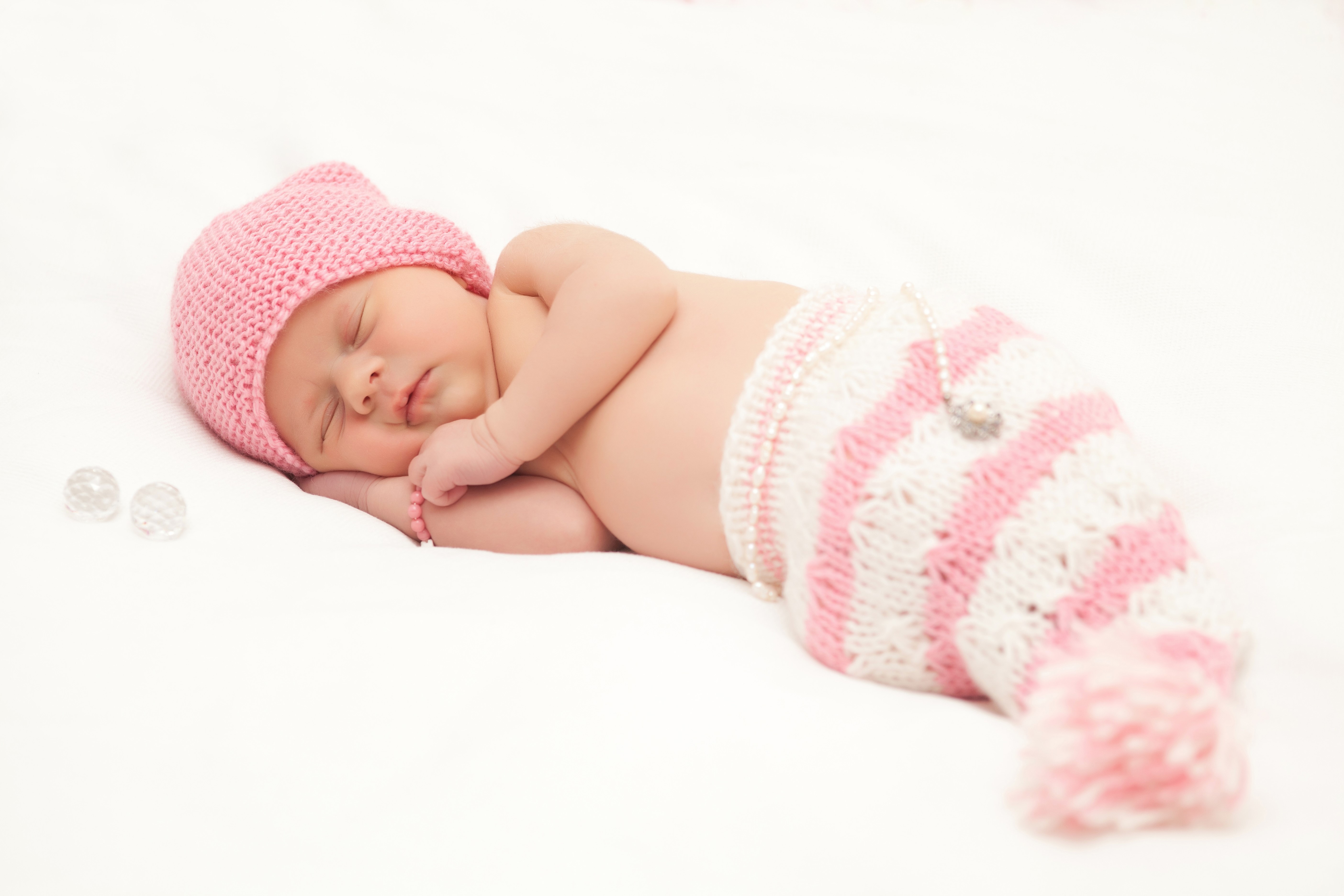 Baby in Pink Knitted Hat and Mermaid Tail HD Wallpaper