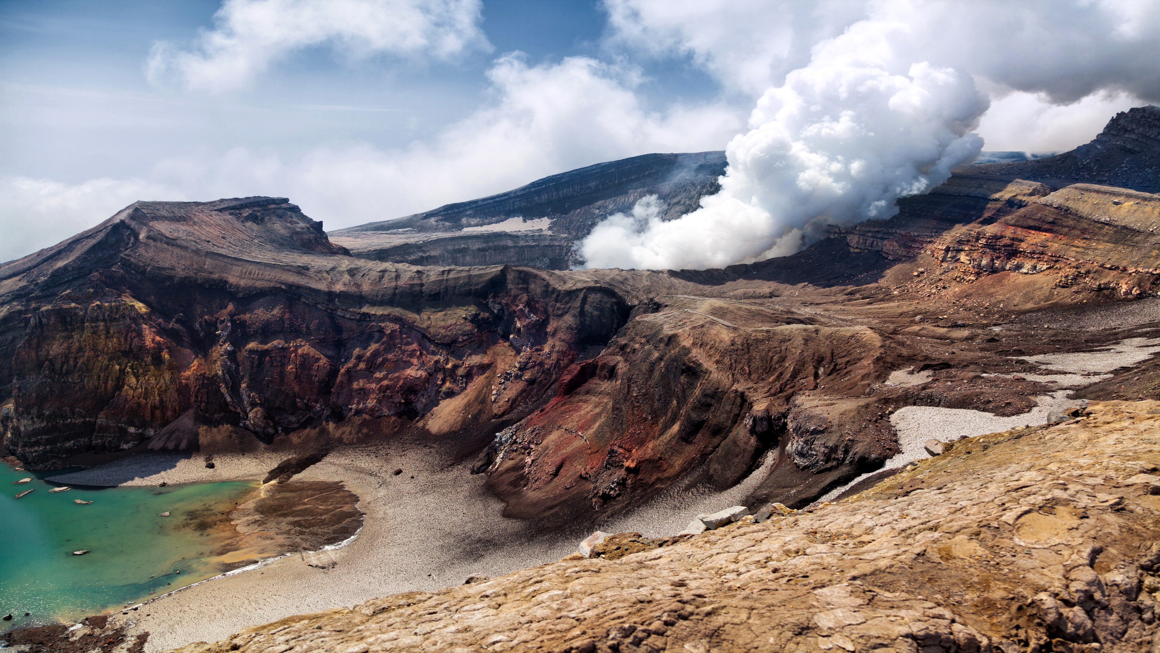 Volcano crater with steam on Kamchatka Peninsula, Russia HD Wallpaper