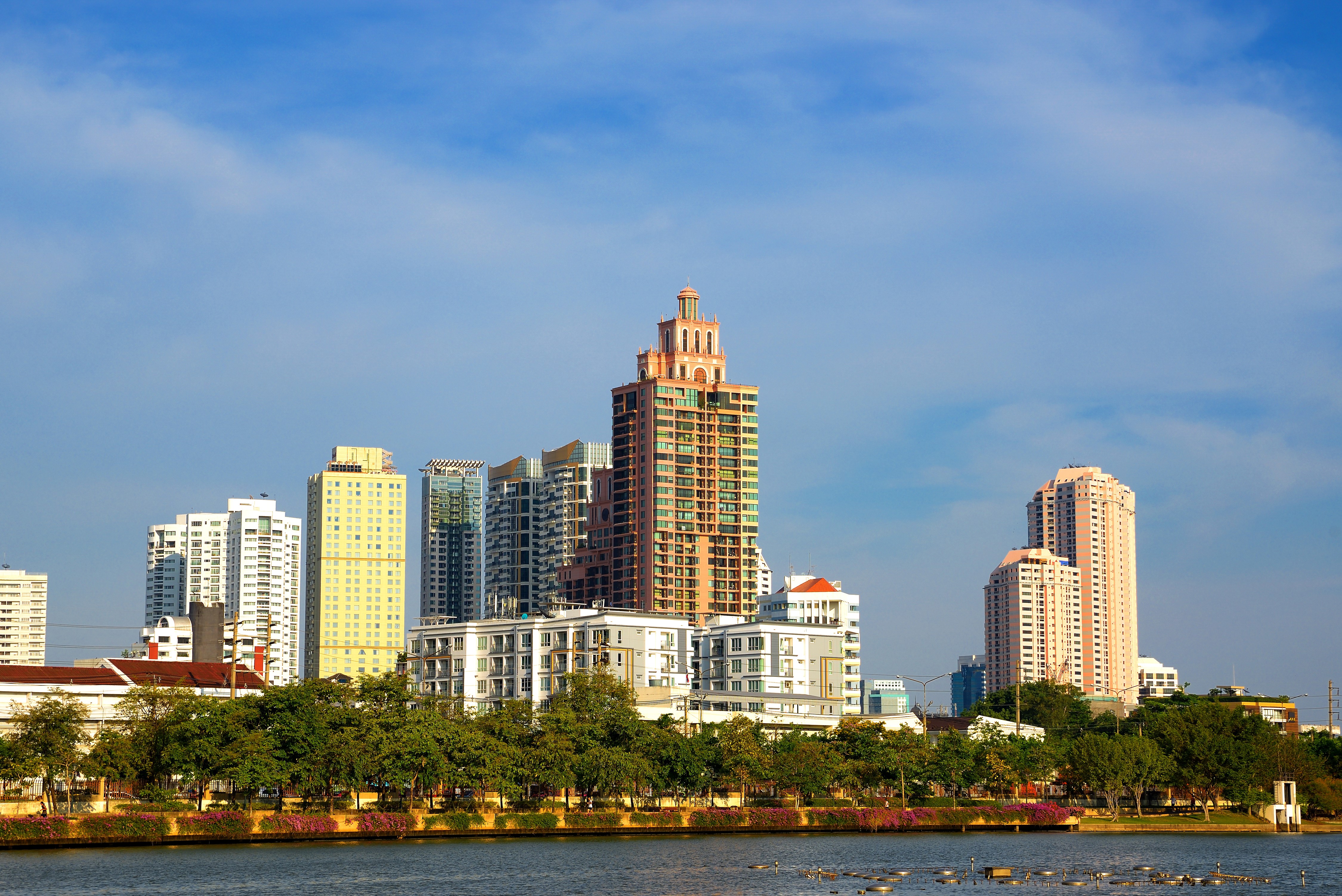 Cityscape with skyscrapers and a river HD Wallpaper
