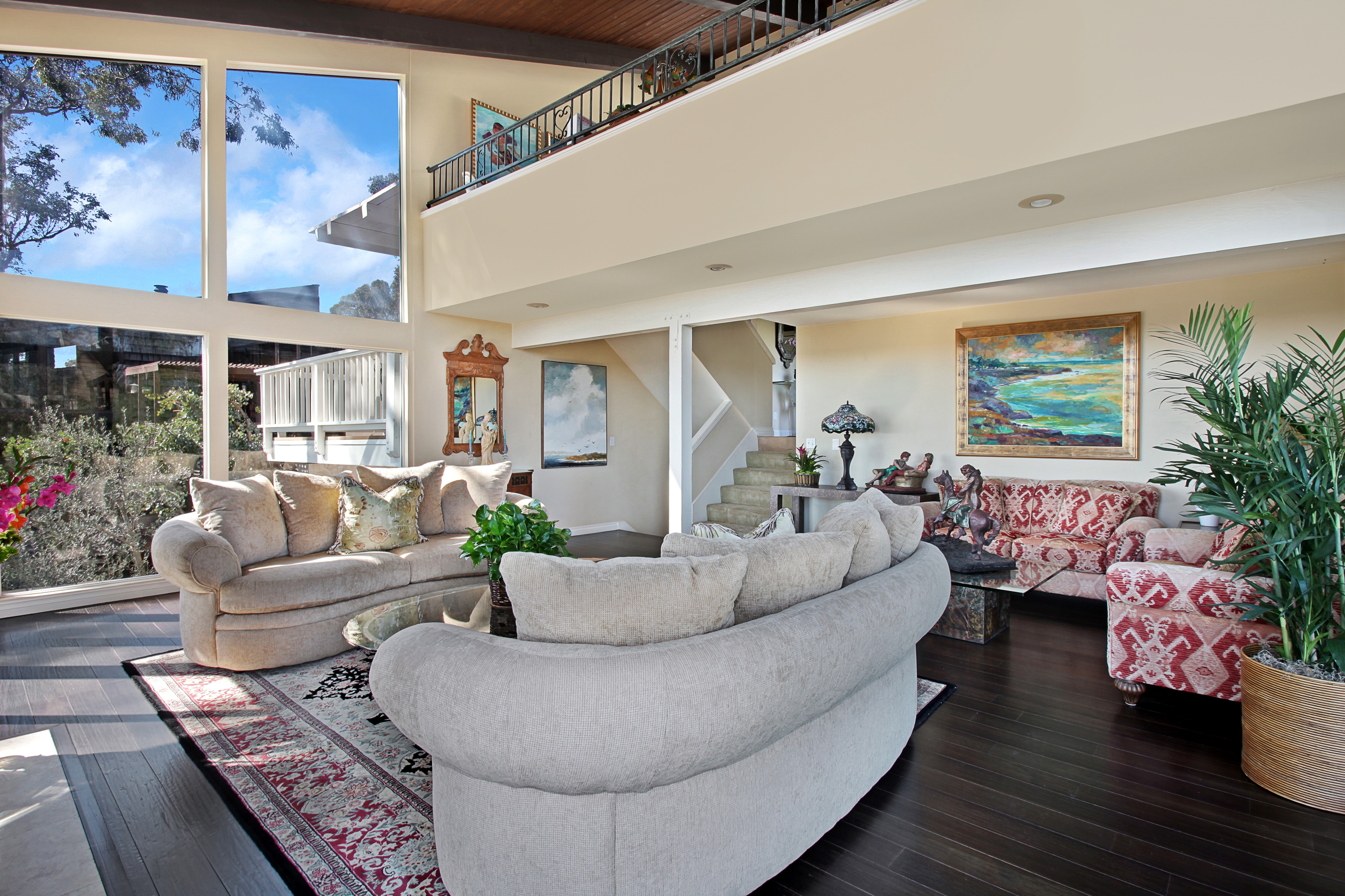 Living room with sofas and large windows HD Wallpaper