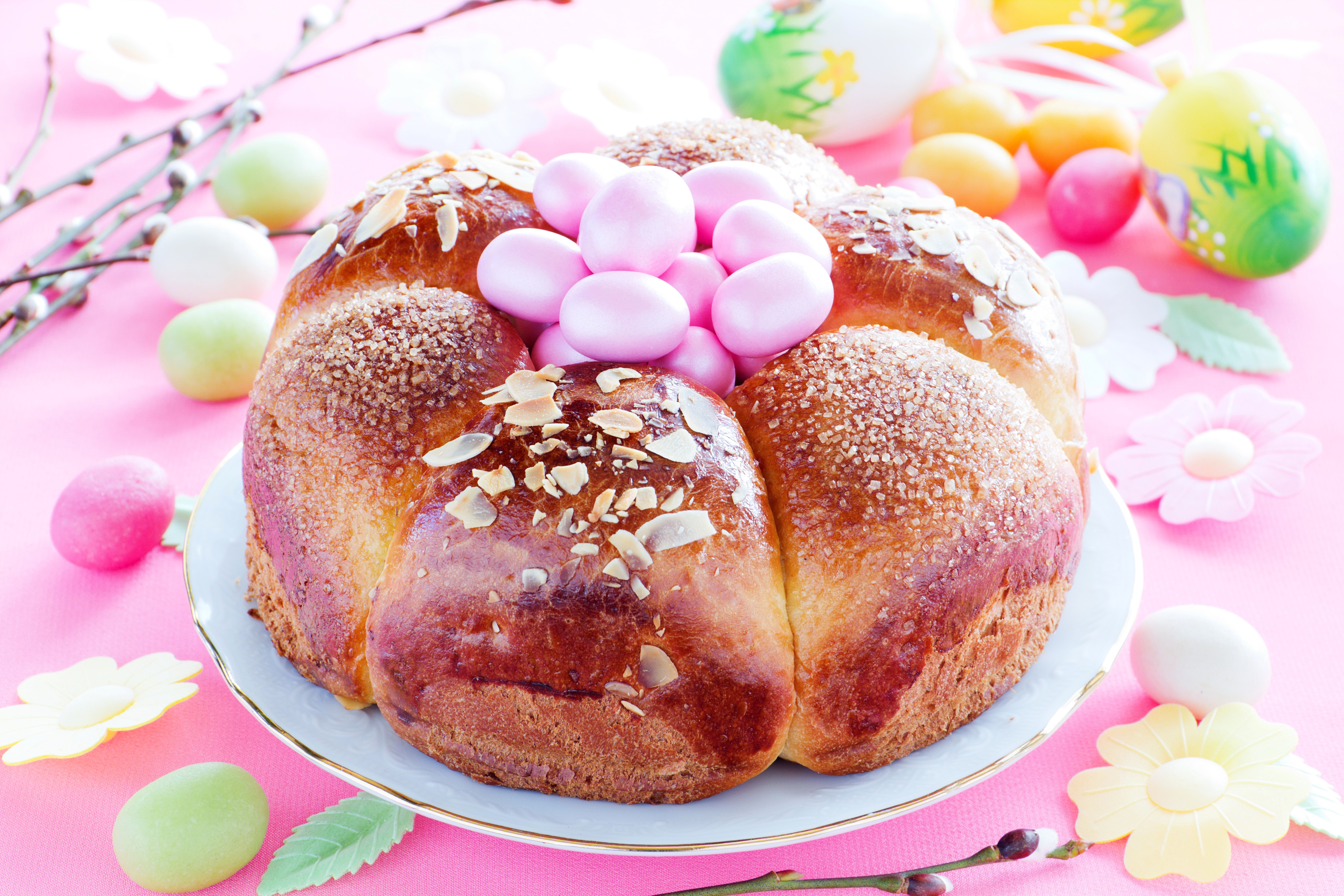 Easter sweet bread with pink eggs and almonds HD Wallpaper
