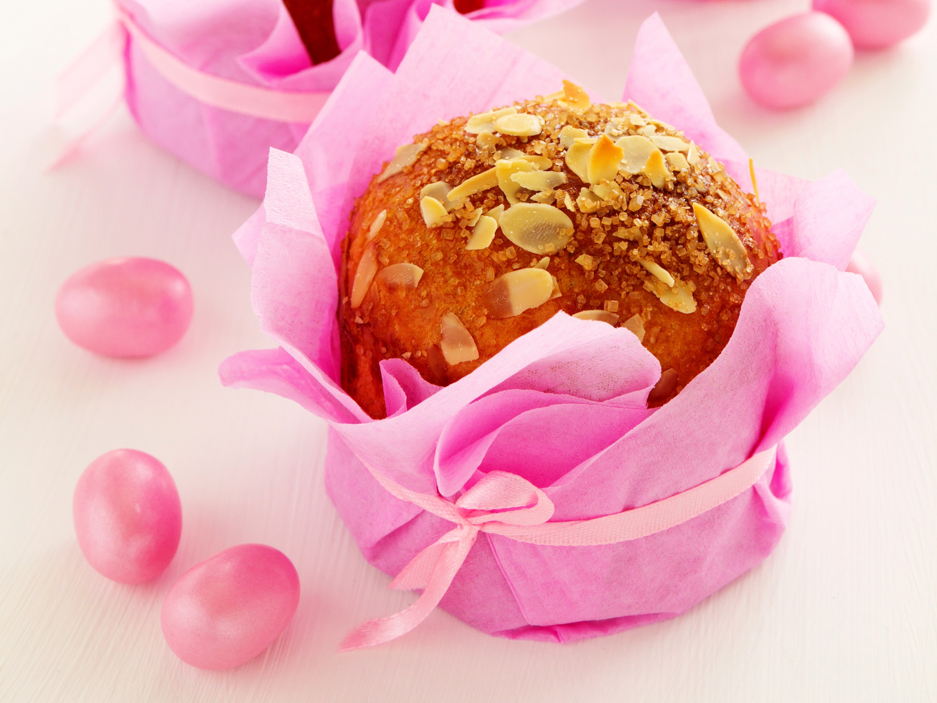 Easter pastry with almonds and pink eggs HD Wallpaper