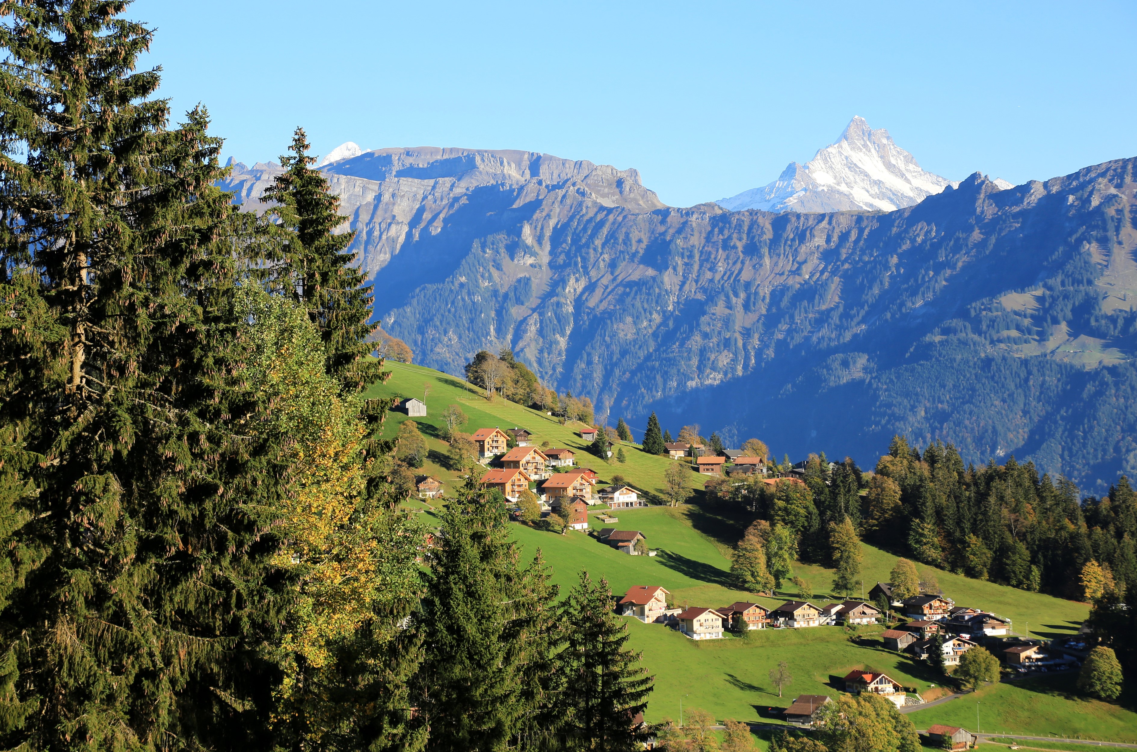 Village in the Swiss Alps with Mountains HD Wallpaper