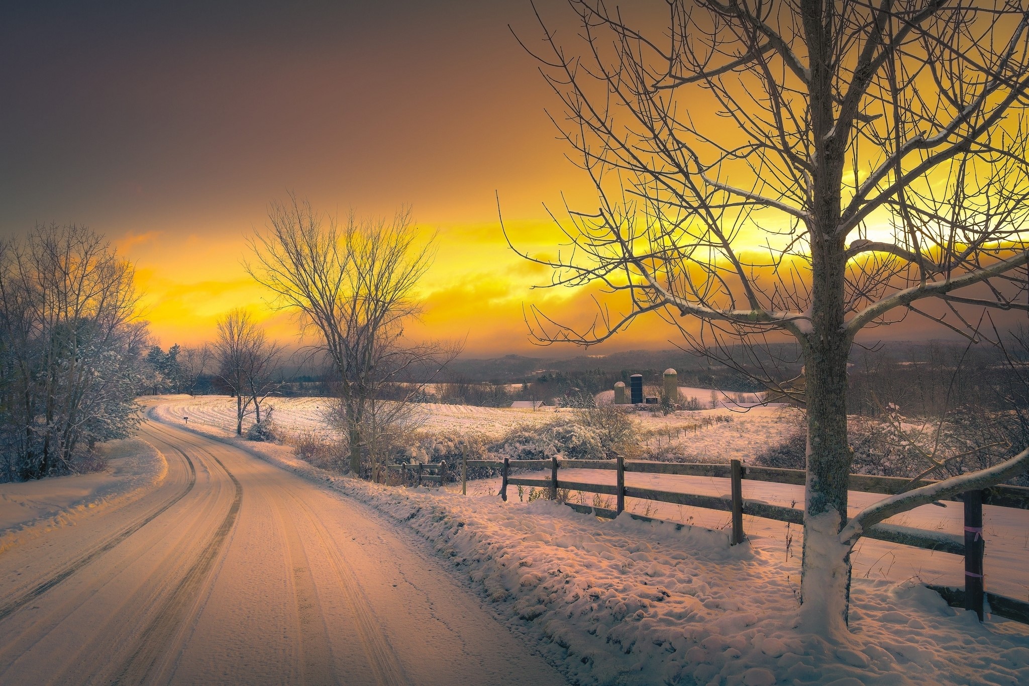 Winter road with snow and trees at sunset HD Wallpaper