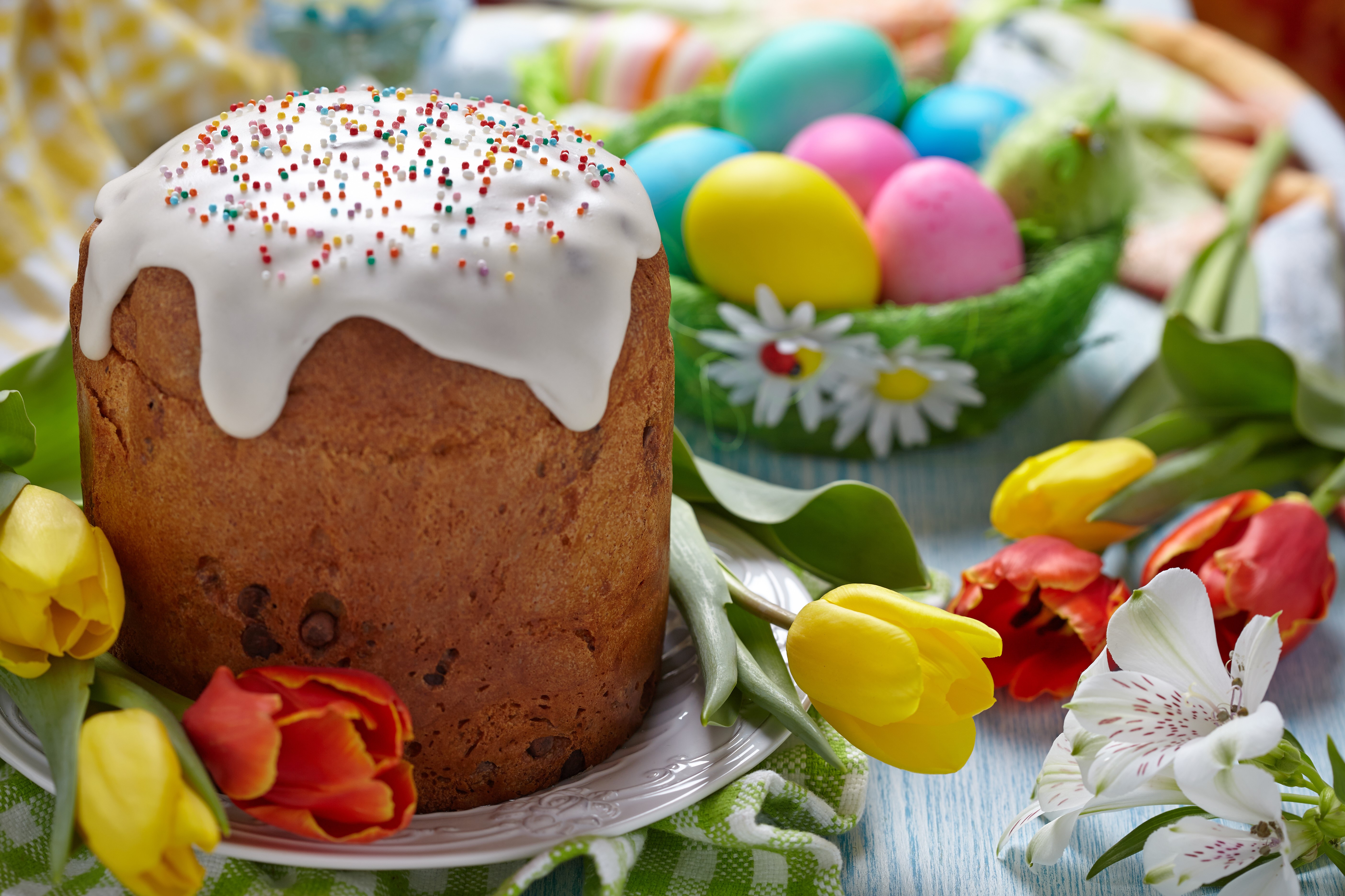 Easter Kulich with Icing Sugar, Eggs, and Tulips HD Wallpaper