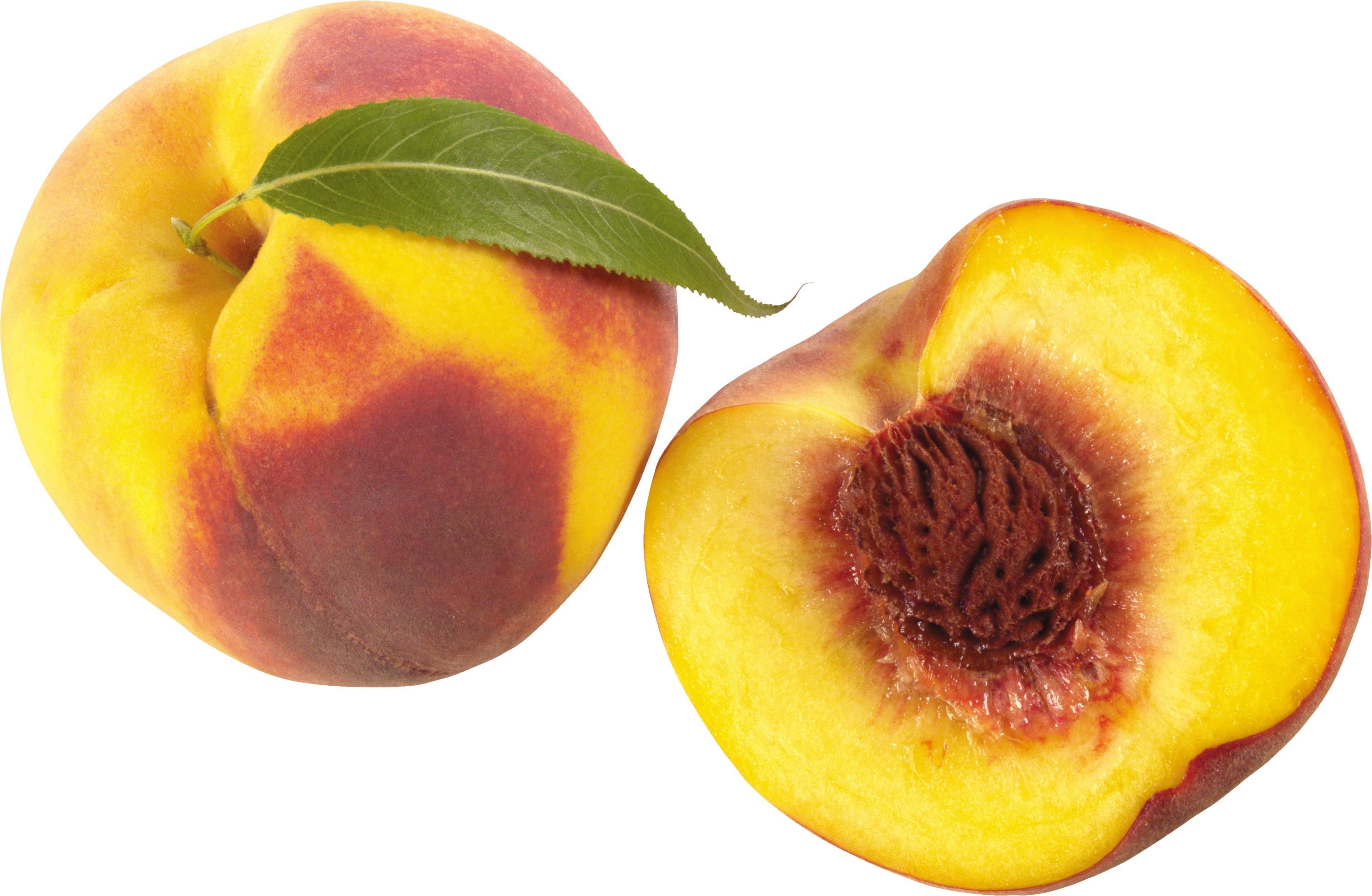 Whole and halved peach with leaf HD Wallpaper