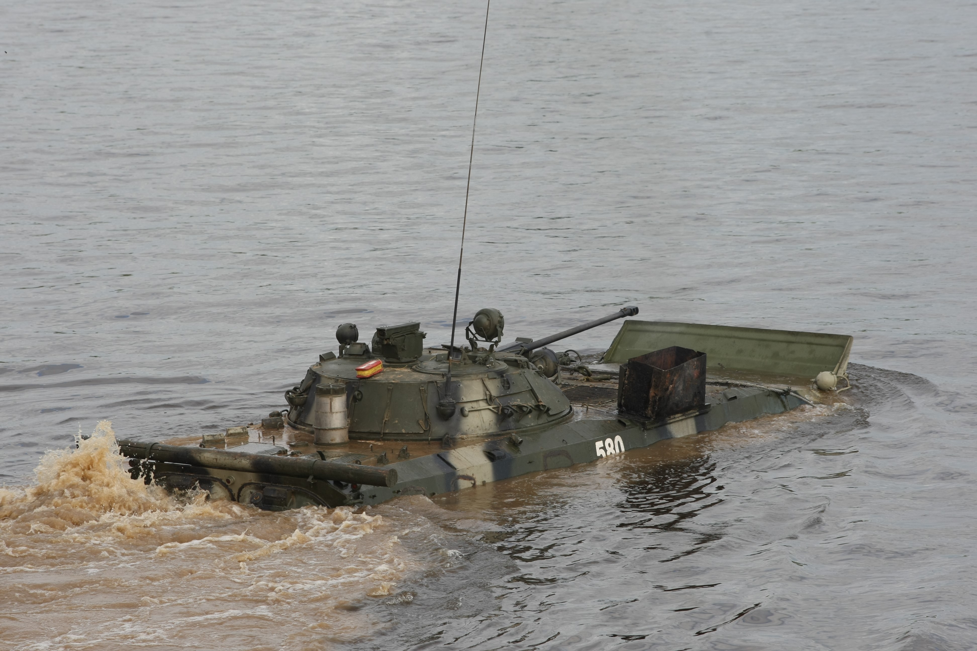 Amphibious IFV crossing a body of water HD Wallpaper