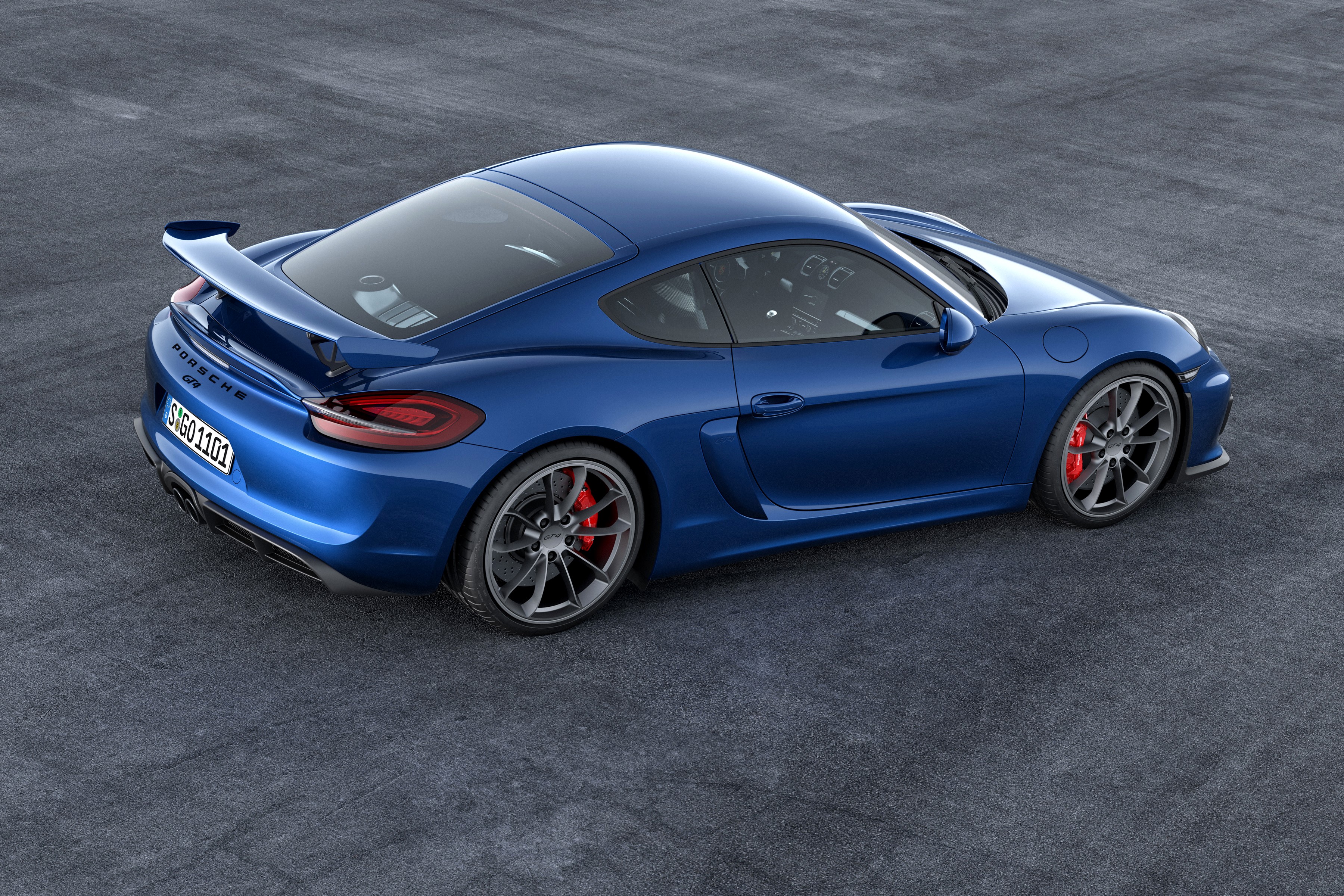 Blue Porsche Cayman GT4 on asphalt HD Wallpaper