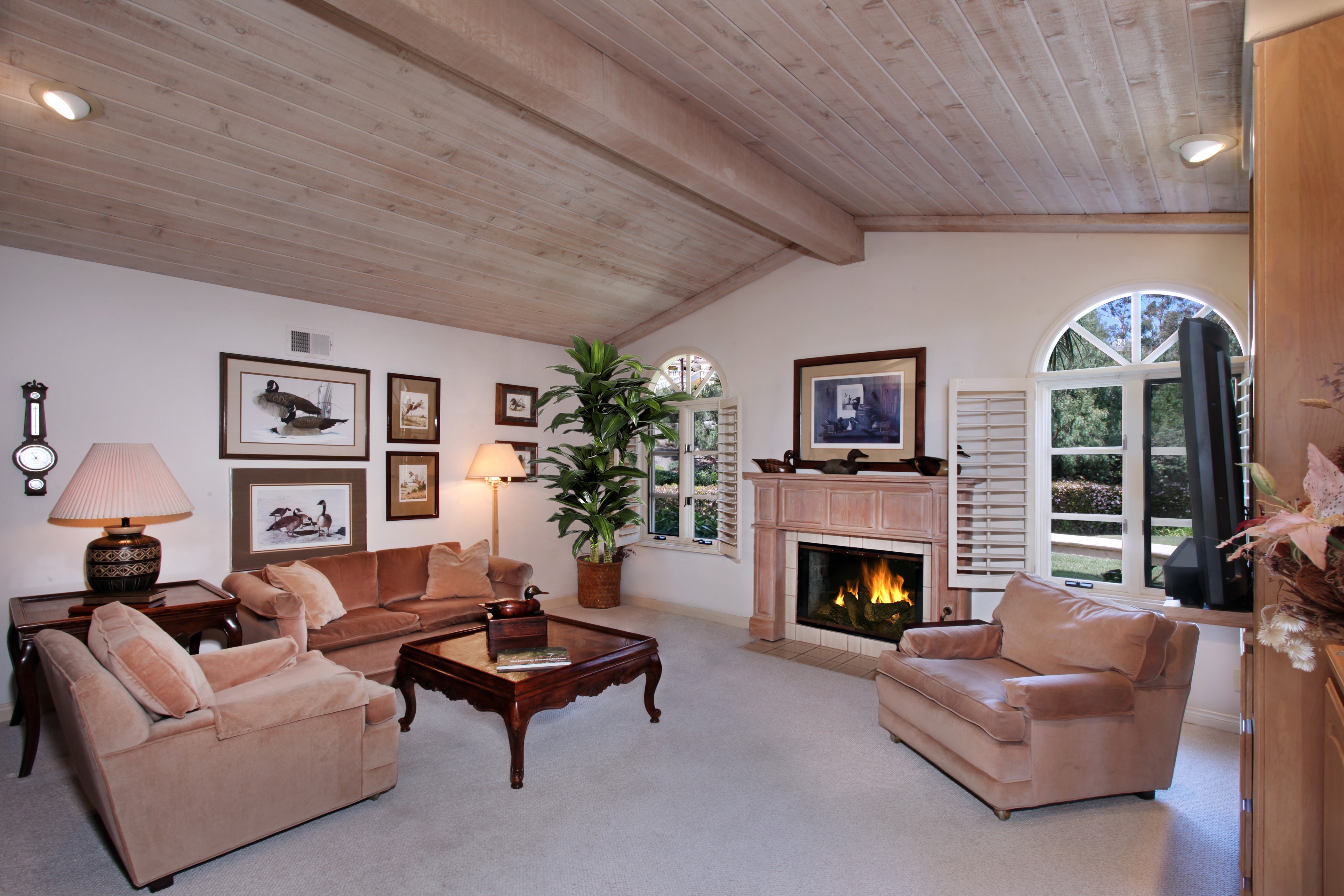 Living room with fireplace and armchair HD Wallpaper