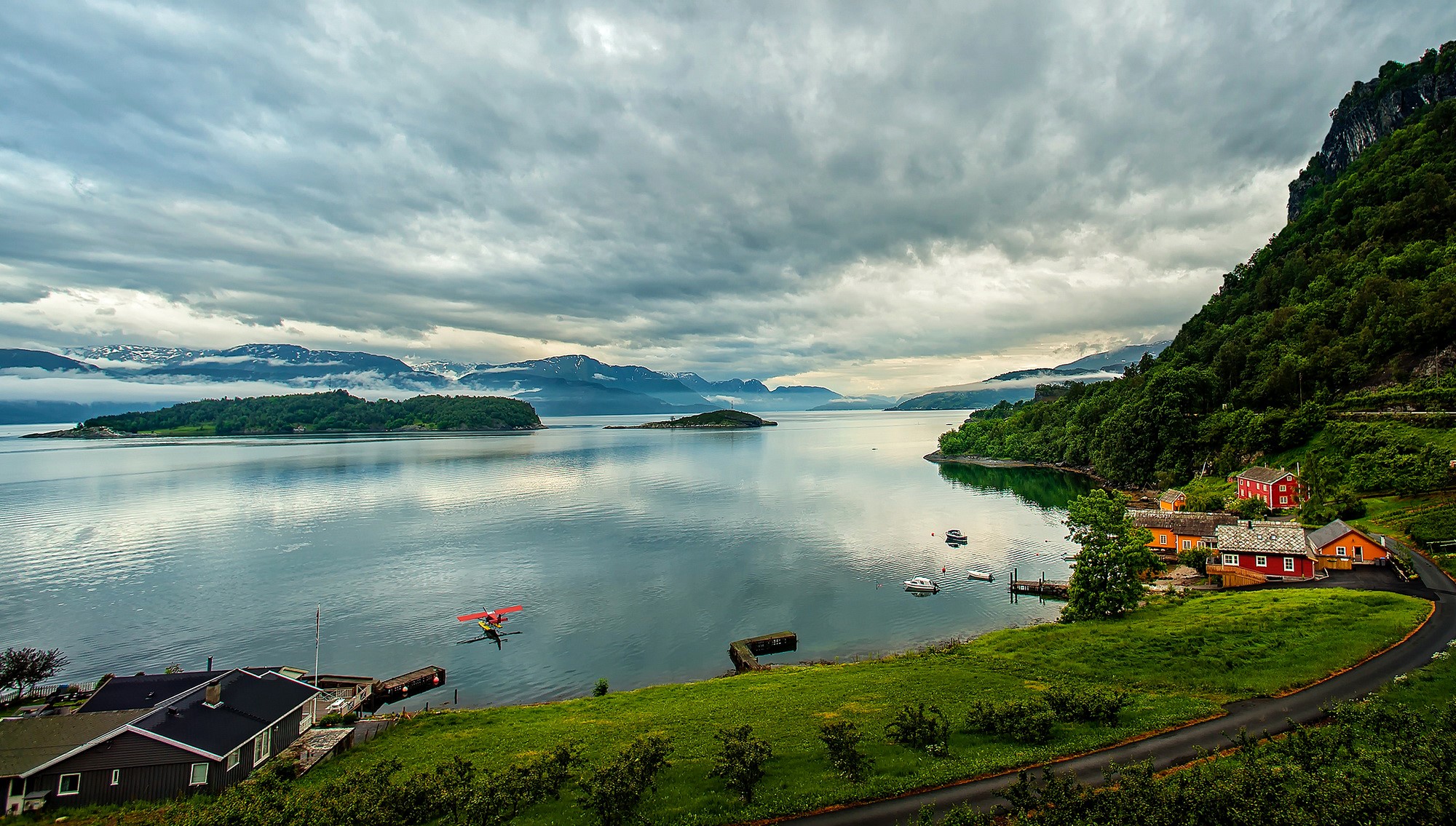Houses on the shore of a fjord in Norway HD Wallpaper