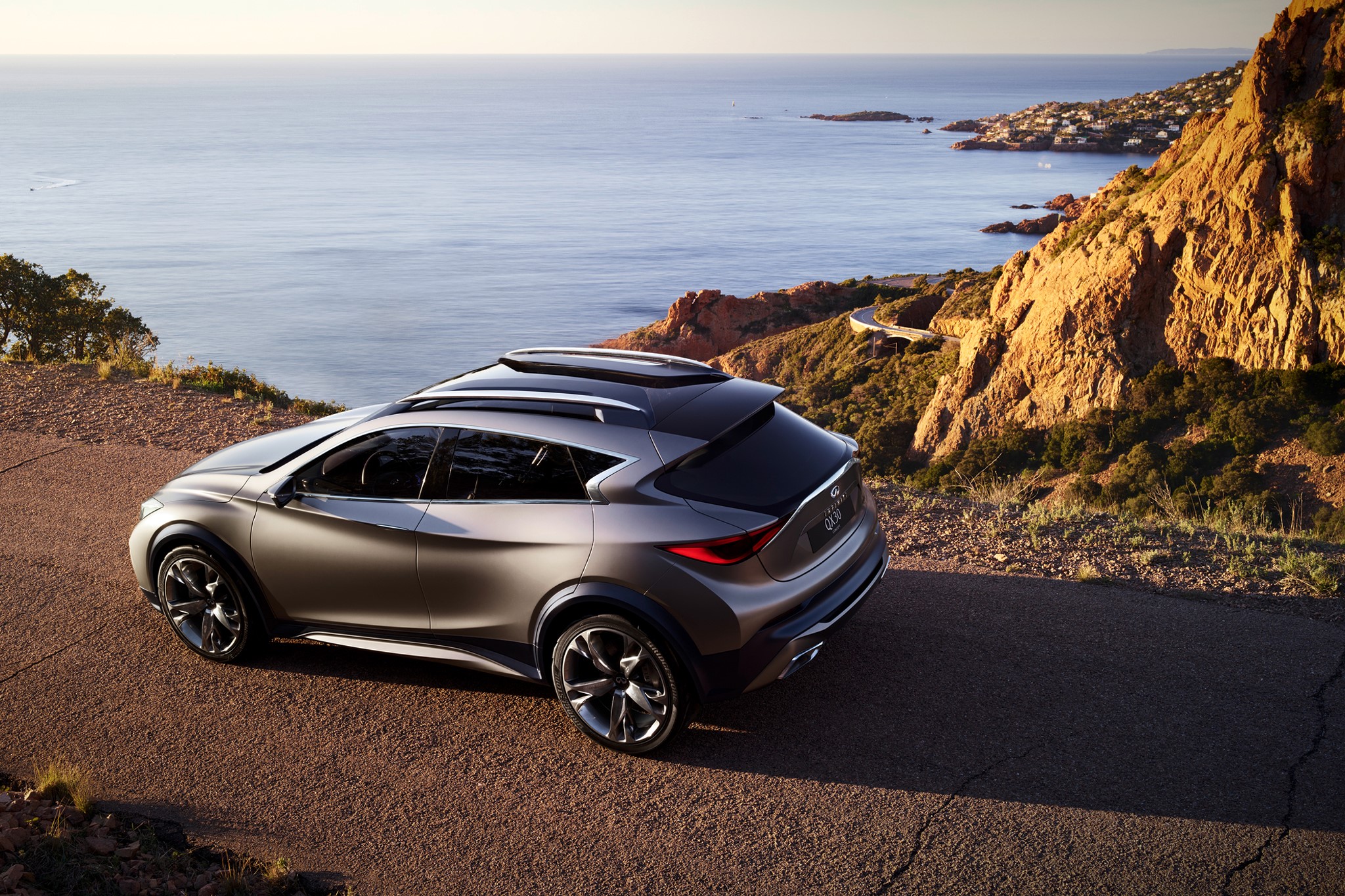Infiniti QX3 Concept Car on a Coastal Road HD Wallpaper