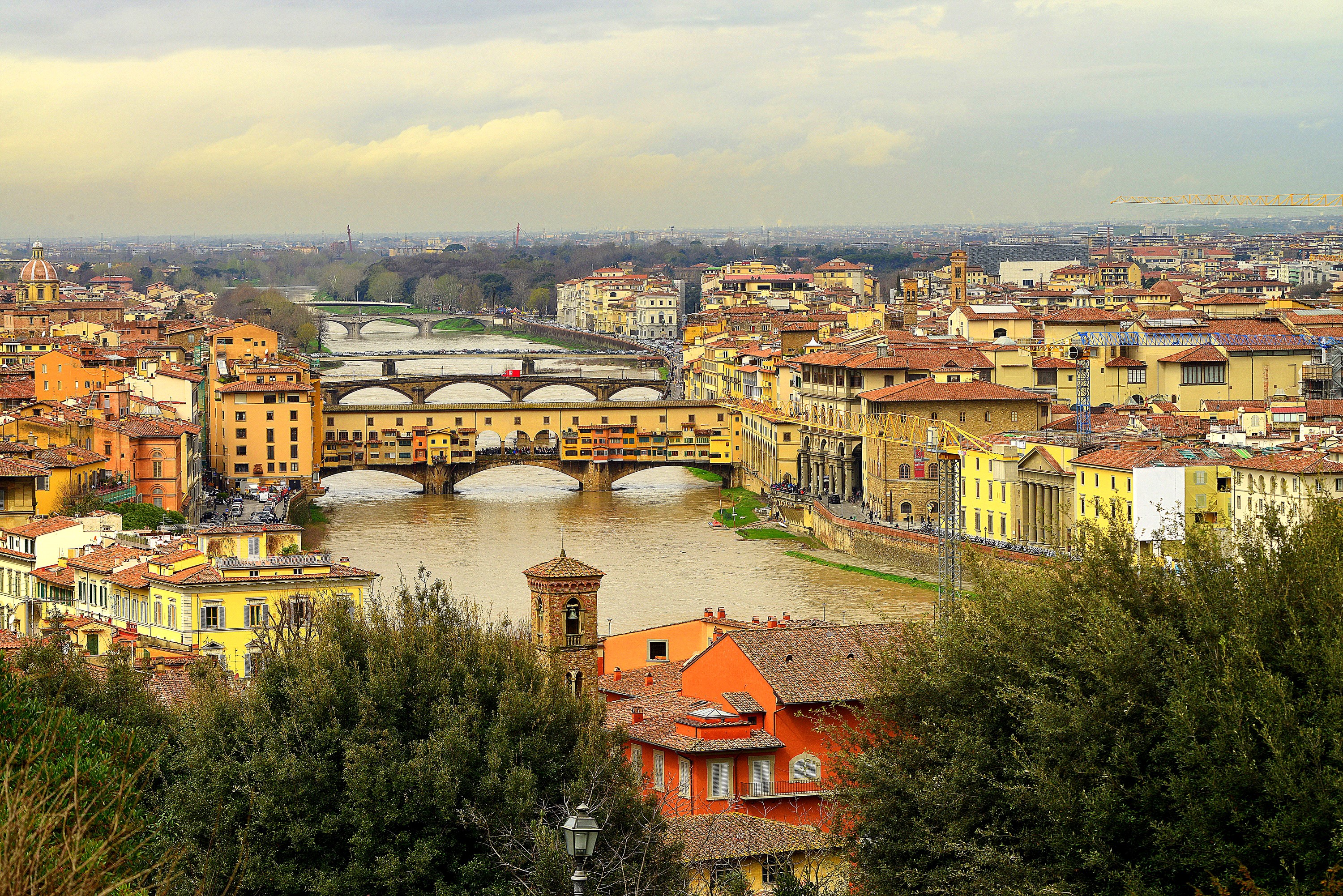Florence cityscape with Ponte Vecchio bridge over Arno River HD Wallpaper