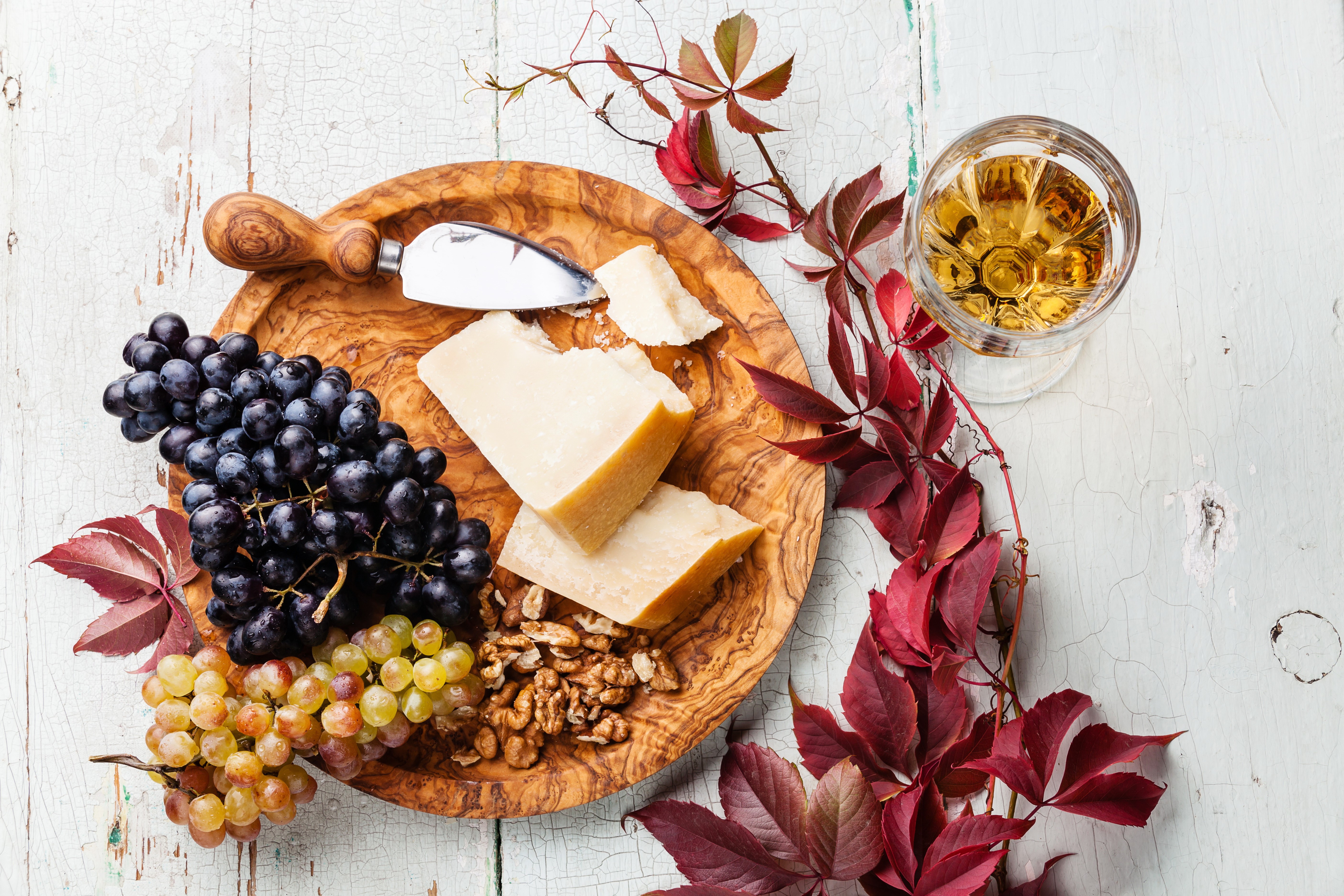 Grapes, Cheese, Nuts, and Wine with Autumn Foliage HD Wallpaper