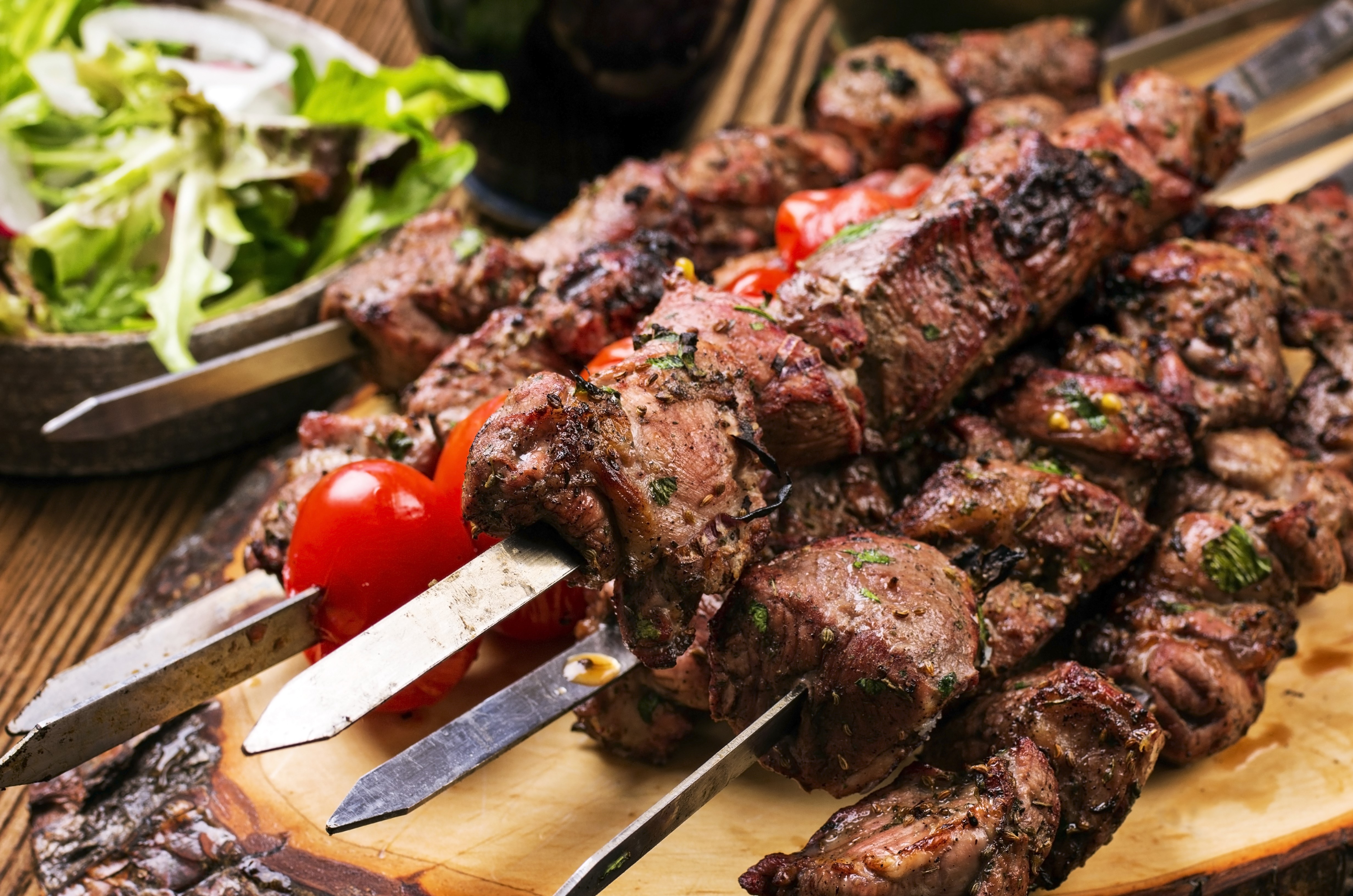 4K Meat Shashlik Skewers with Tomatoes and Salad HD Wallpaper
