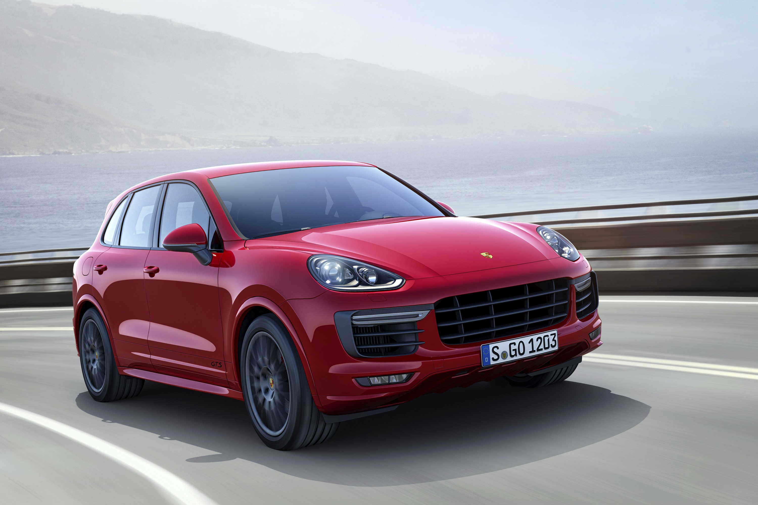 Red 2015 Porsche Cayenne GTS 4 on a road HD Wallpaper