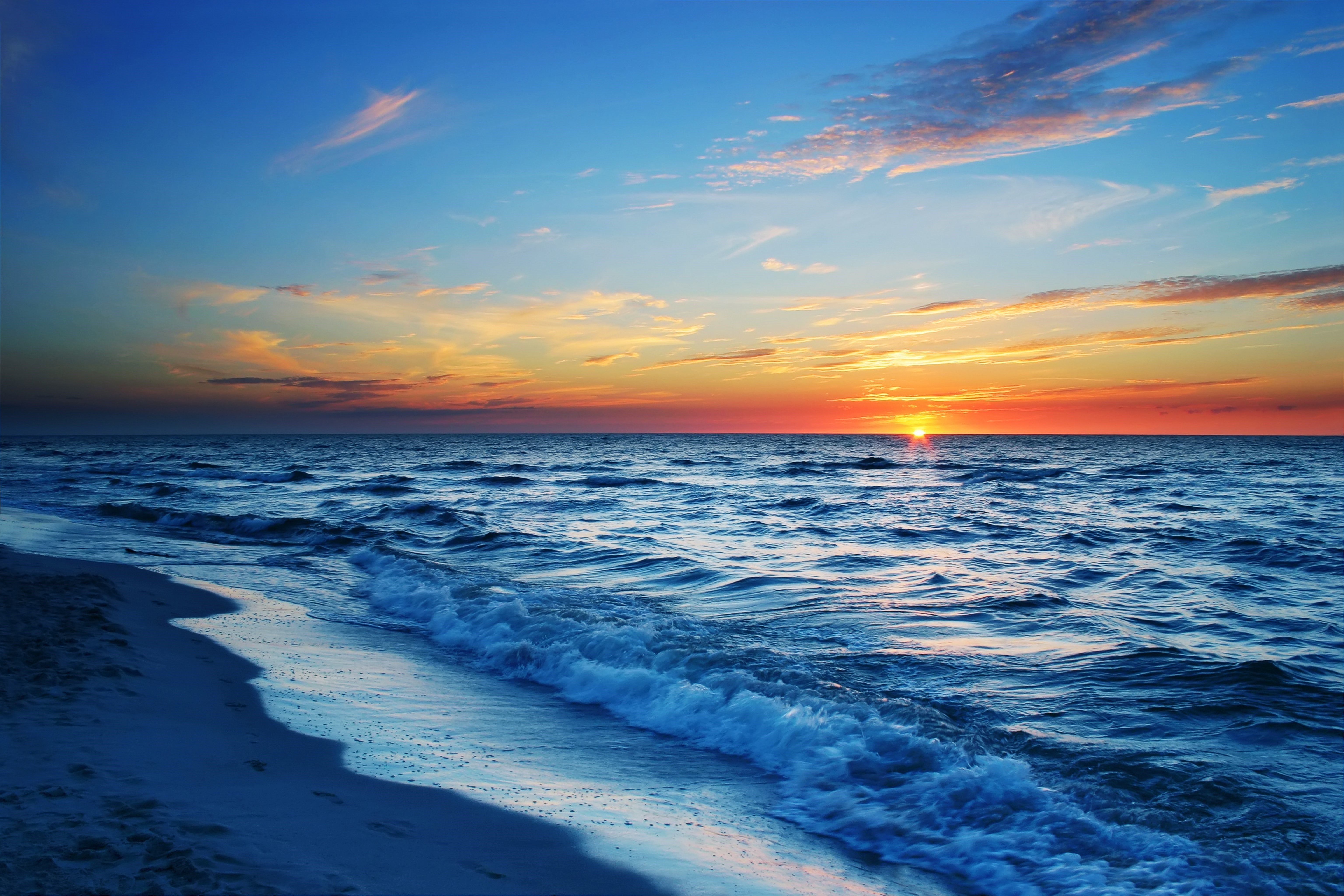 Sunset over the sea and coast HD Wallpaper
