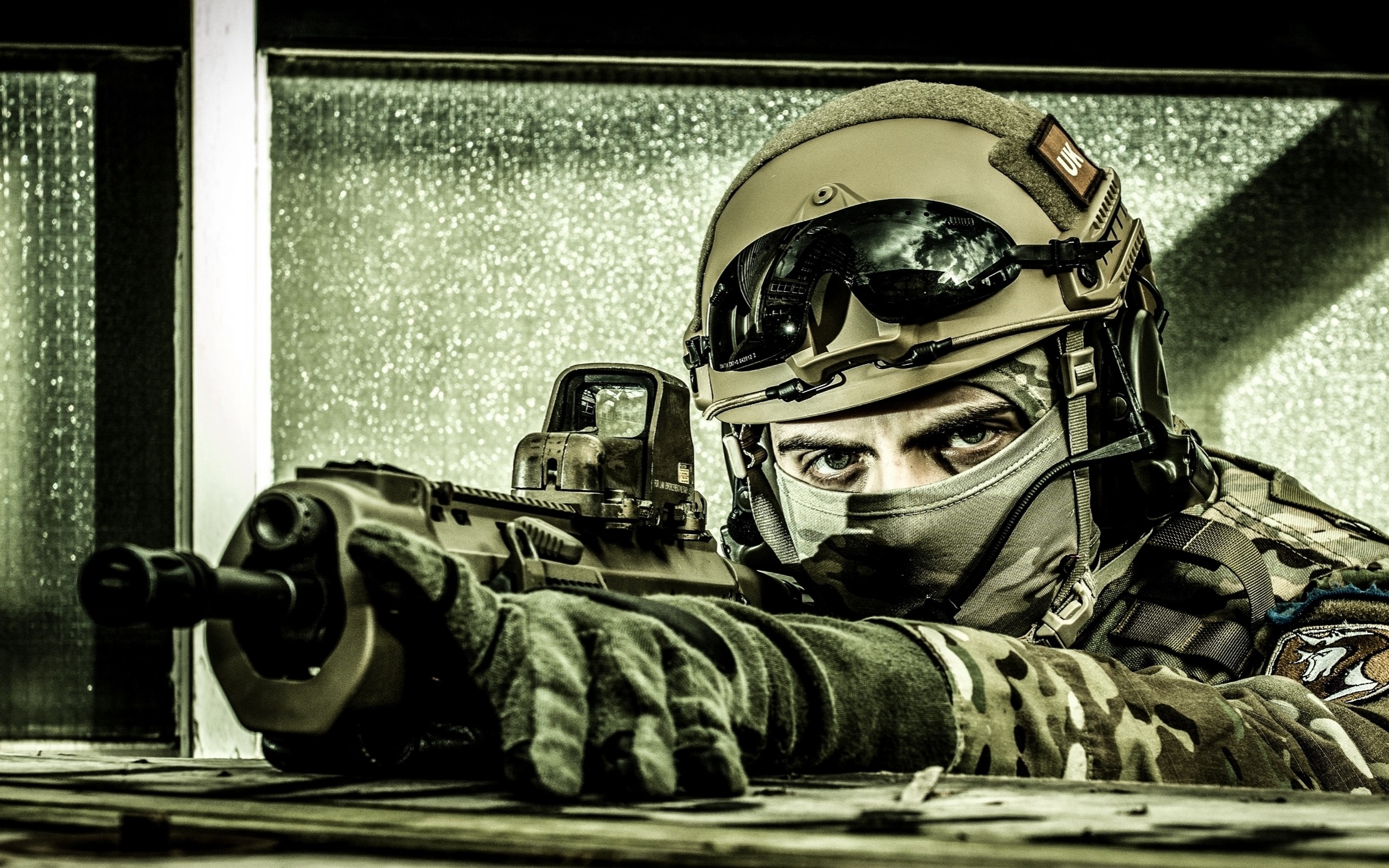 Soldier in military helmet aiming a rifle HD Wallpaper